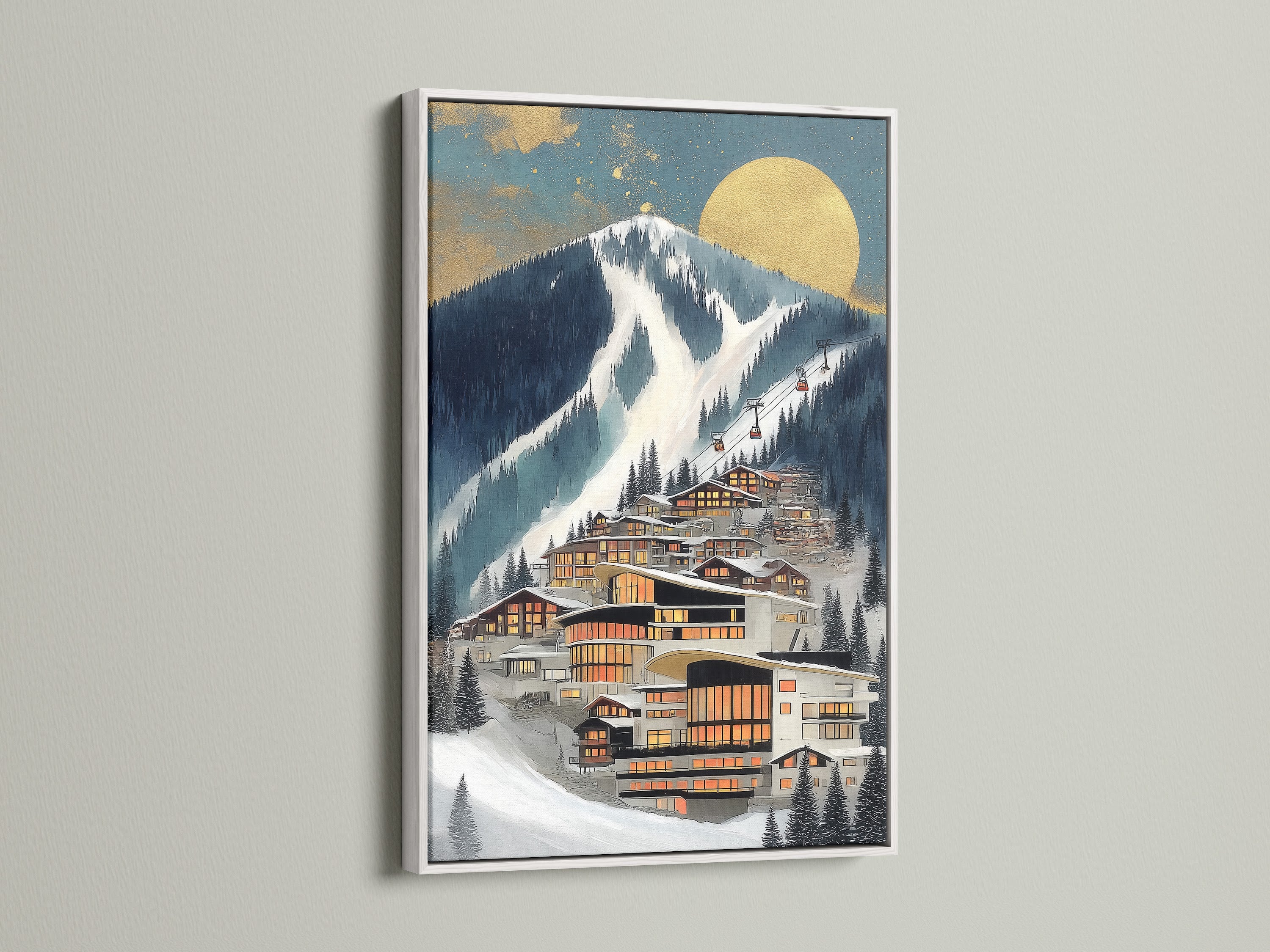 A framed Alpine Village artwork is displayed. The frame is white. This contemporary canvas art brings a winter landscape indoors. It is suitable for mountain home decor. It enhances the ambiance of ski lodges.