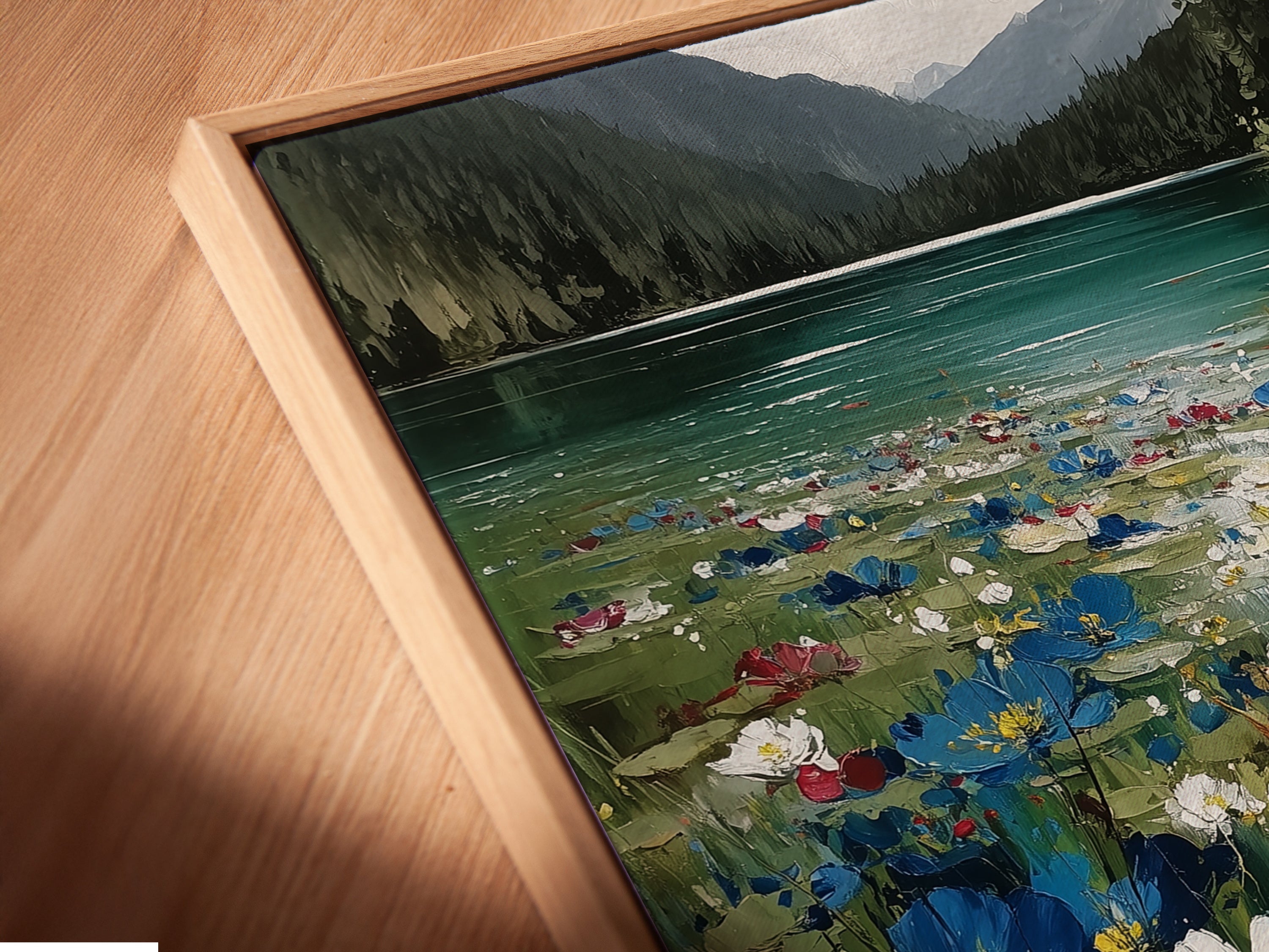 Close-up angled view of a canvas print in a floating frame. The floating frame gives the artwork a modern gallery look. It enhances the visual appeal of the flower wall art. The frame highlights the details.