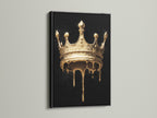 Melting Crown artwork with a black frame. The artwork features a gold melting crown on a black background. The black frame enhances the dramatic effect of the art. Add a touch of gothic style to your space.
