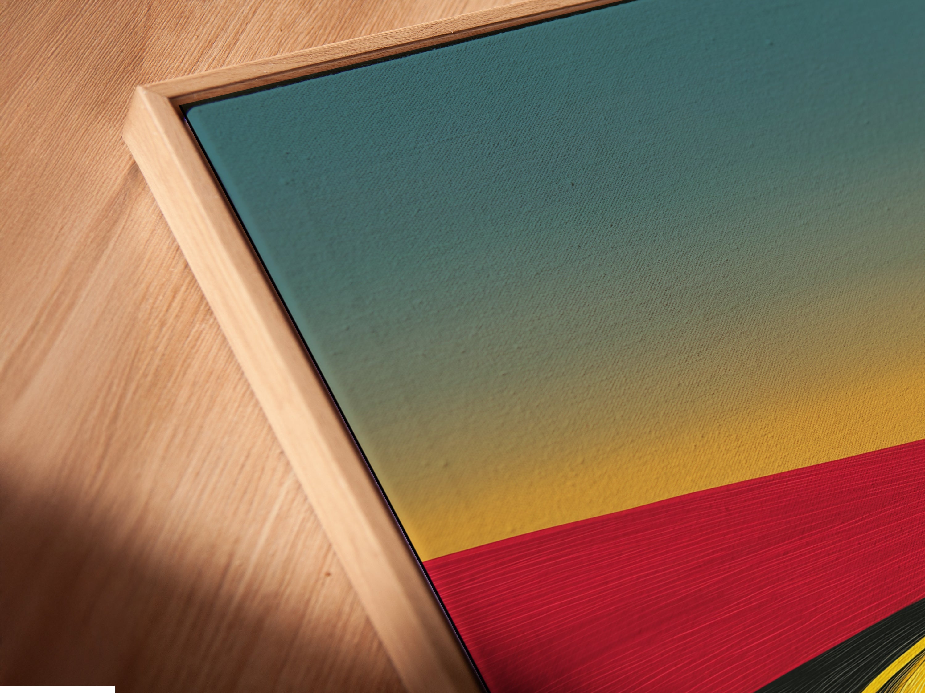 Close-up angled view of a canvas print in a floating frame. The desert road artwork shows off its earth tones. This abstract landscape wall art enhances the modern artwork. It is perfect for adding an elegant touch to any space. Consider this for office decor or your living room.