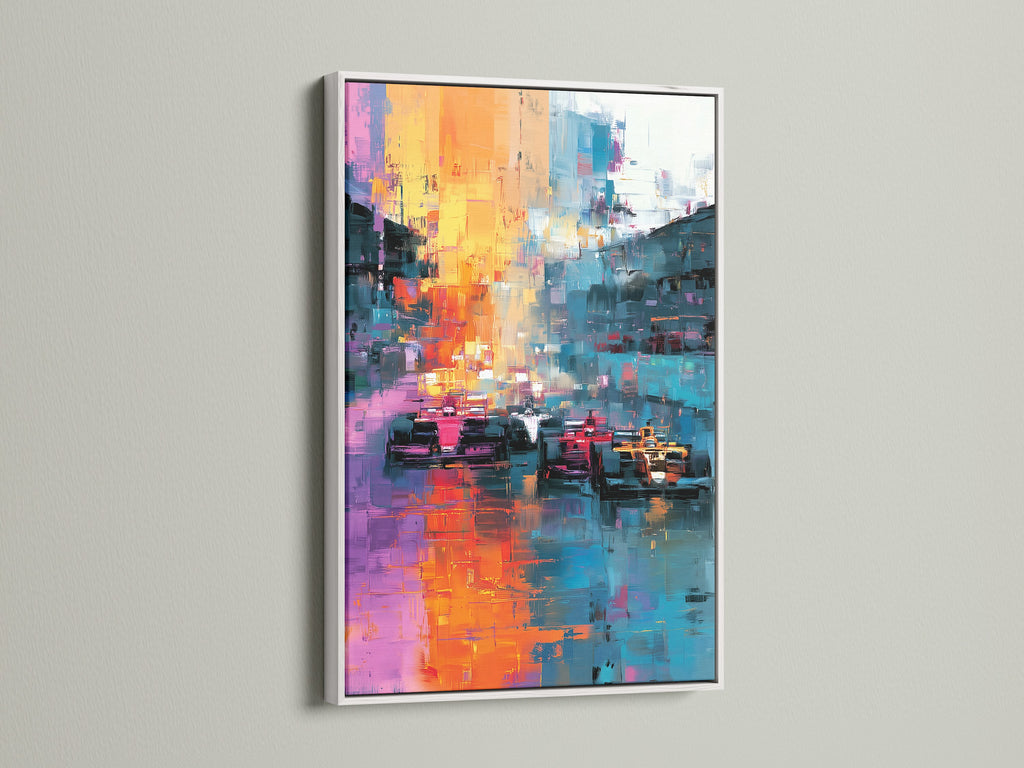 Abstract race car artwork framed in white hangs on a wall. The white frame gives a modern look. The art brightens the space. This artwork adds style to your home. The artwork is ready to hang.