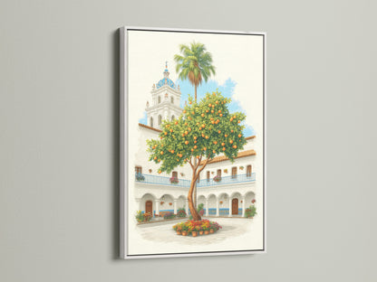 Spanish Courtyard artwork displayed in a white frame. The artwork features a white building with a blue dome and an orange tree. A white frame offers a clean modern look. Perfect for adding a cultured atmosphere to any room in your home.
