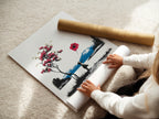 A woman is carefully rolling a fine art poster paper. The poster paper is handled with care. Preparing it for framing or display. Fine art poster paper ensures high quality prints. Preserve the beauty of your art.