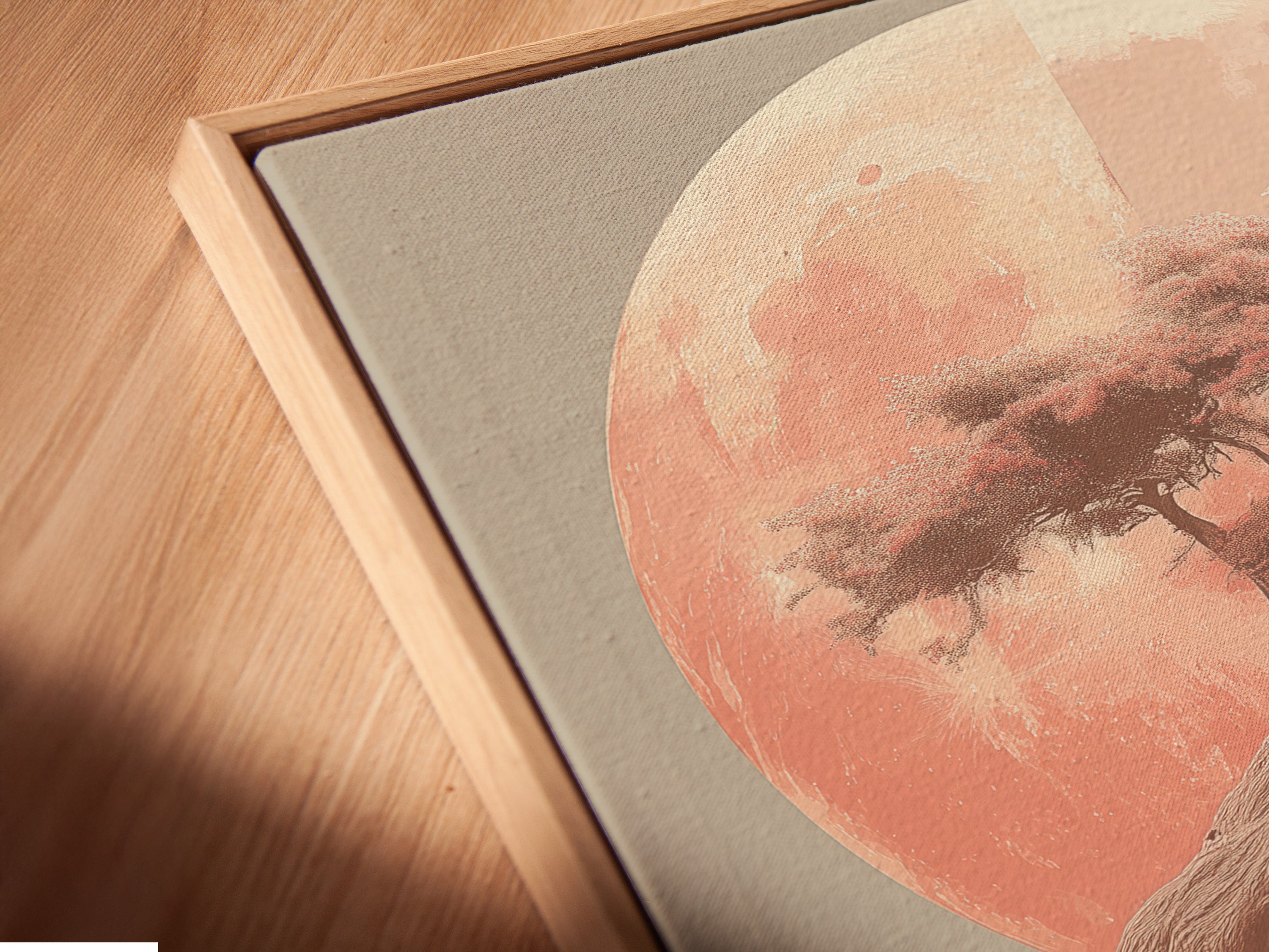 Angled close up of a Zen Tree canvas print. This art features a floating frame. Coral pink hues create a peaceful meditation vibe. Perfect as zen decor for a tranquil bedroom or living space.