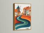 The whimsical village artwork is gloriously presented in a gold frame. The teal and terracotta hues create a vibrant abstract landscape. This unique canvas art adds a touch of luxury to your decor. A perfect housewarming gift for those who love European-inspired artwork.