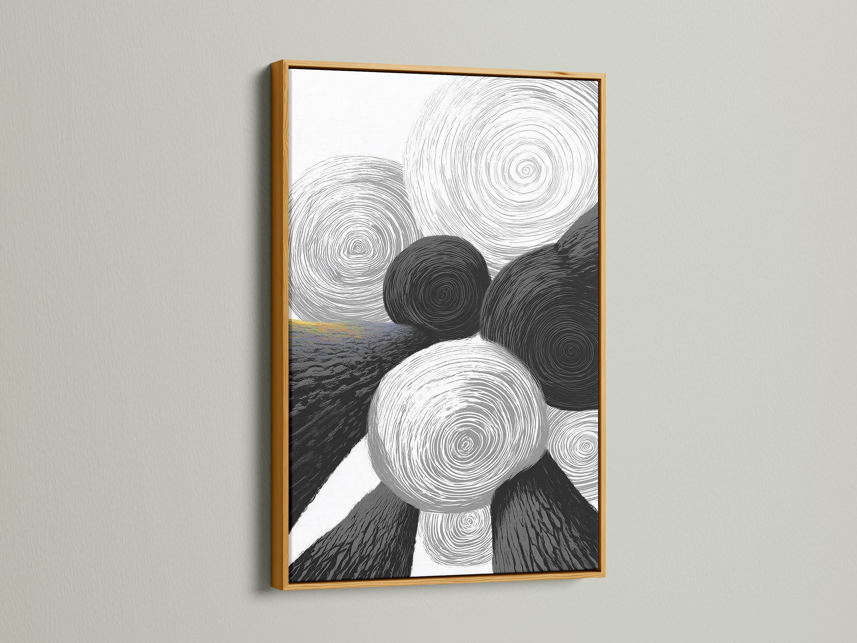 A stunning piece of geometric abstract art with black and white circles. The artwork is highlighted by a gold frame. It adds a touch of luxury to the minimalist art. Perfect for creating a focal point in any modern room. This will elevate your decor.