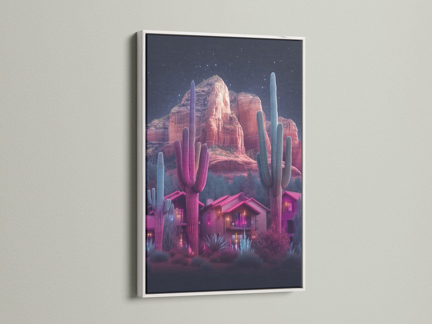 Neon cactus artwork featuring a desert landscape inside a white frame. The artwork showcases a southwestern scene with vibrant pink and teal hues. A great addition to any room. It will elevate your home wall decor with this succulent art.