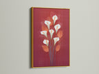 The calla lily artwork is displayed in a gold frame. The gold frame adds a touch of elegance to this floral artwork. Consider it for a luxurious botanical poster display. Perfect for creating eye-catching flower wall decor.