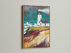 A lighthouse coastal canvas artwork is showcased in a gold frame. This nautical seascape artwork brings a luxurious coastal feel to any room. Perfect for interior designers seeking elegant wall decor. The gold frame enhances the teal and gold accents in this ocean art. Transform your living room or bedroom with this exquisite sea landscape.