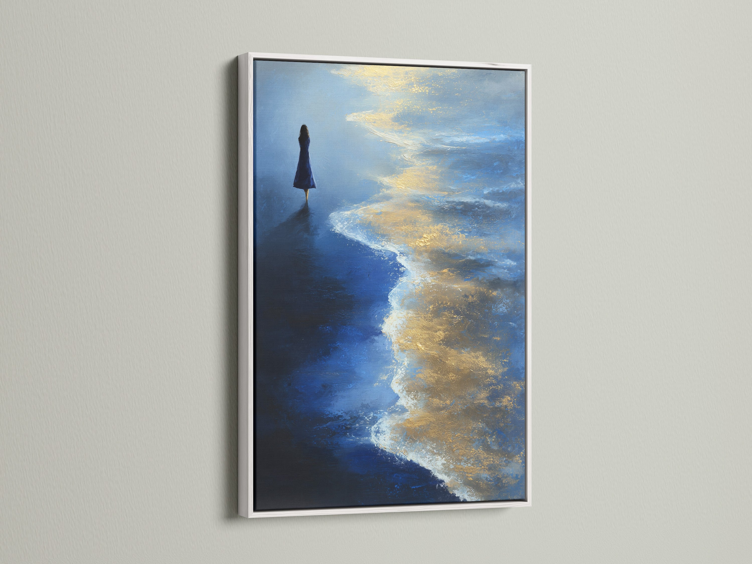 Ocean Solitude artwork with a white frame. The fine art print captures the essence of coastal living. The blue and gold colors evoke a sense of peace. Ideal for bedroom wall decor or living room wall art.