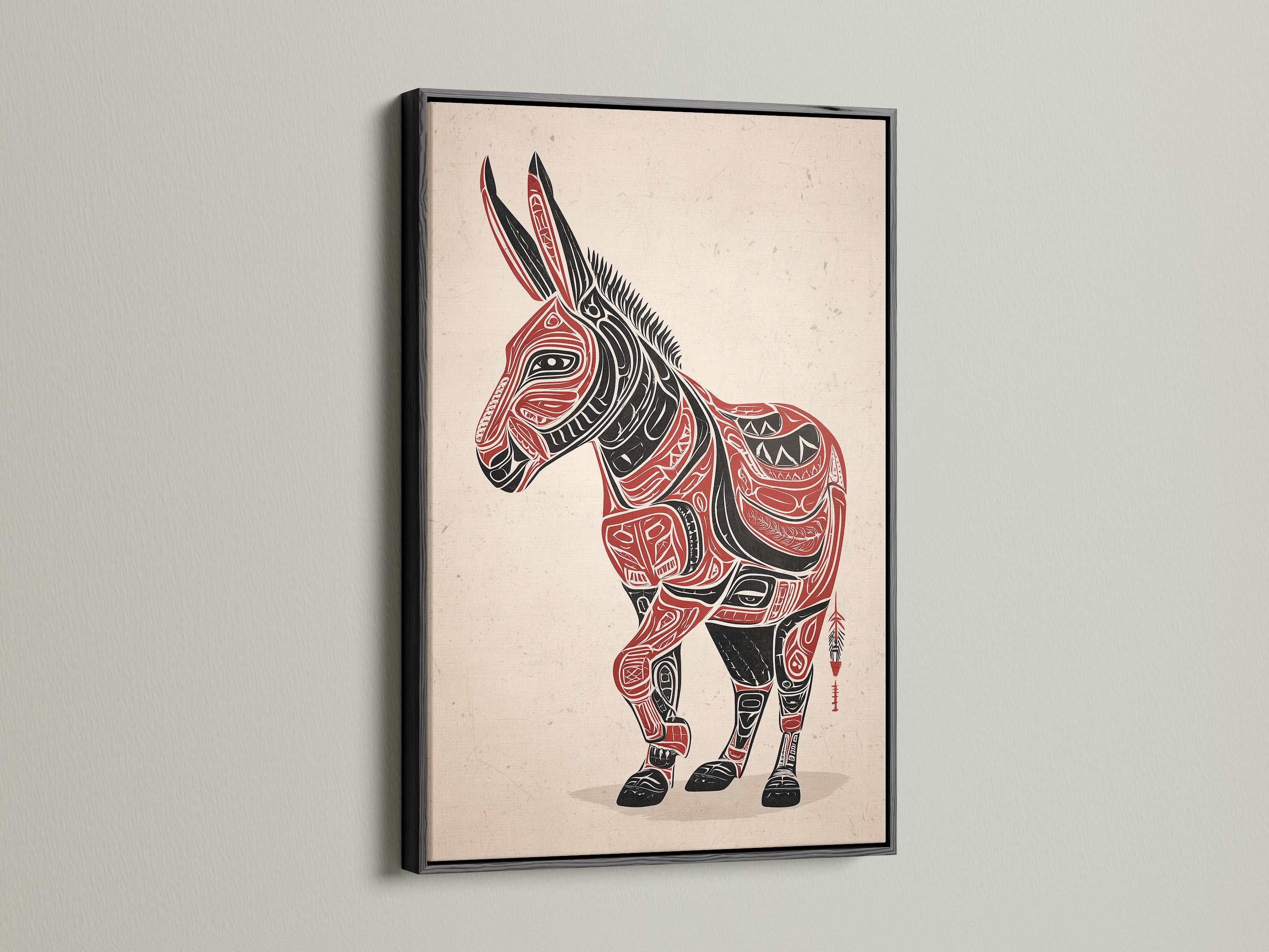 This image displays the Tribal Donkey art in a black frame. The black frame accentuates the red and black artwork. The donkey wall art stands out. It is a striking piece of native american art. The southwestern decor is suitable for various settings. This tribal canvas print adds sophistication.