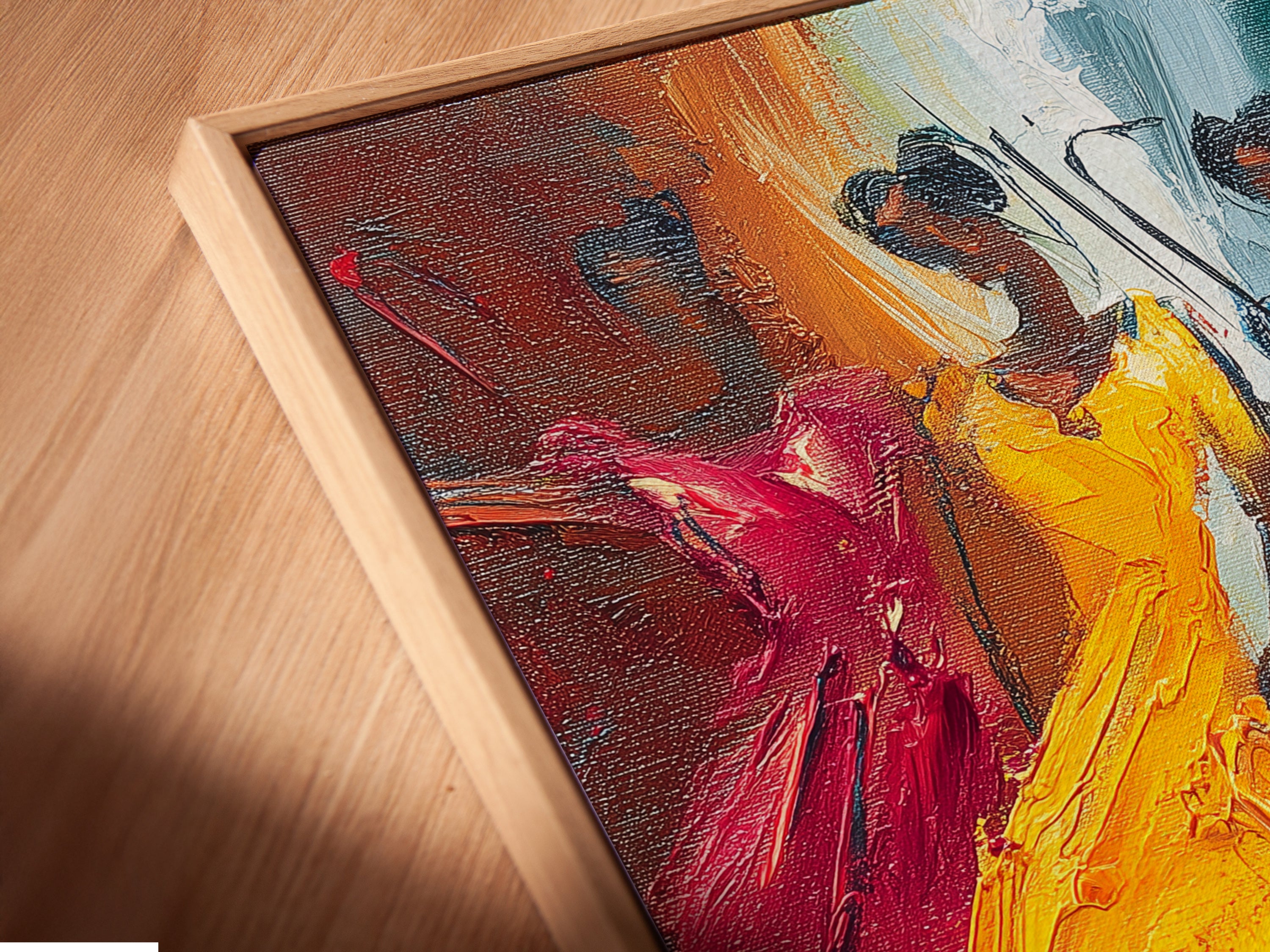 A close-up angled view of the Dancing Figures canvas print. The artwork is beautifully presented in a floating frame. This expressive art style adds depth and dimension to your wall decor. It is perfect for modern spaces.