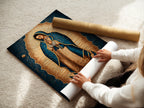 A woman carefully rolls a fine art poster paper of Our Lady of Guadalupe. This print captures the essence of faith wall decor. Perfect for creating Catholic home art. Ideal for prayer rooms and spaces needing sacred art.