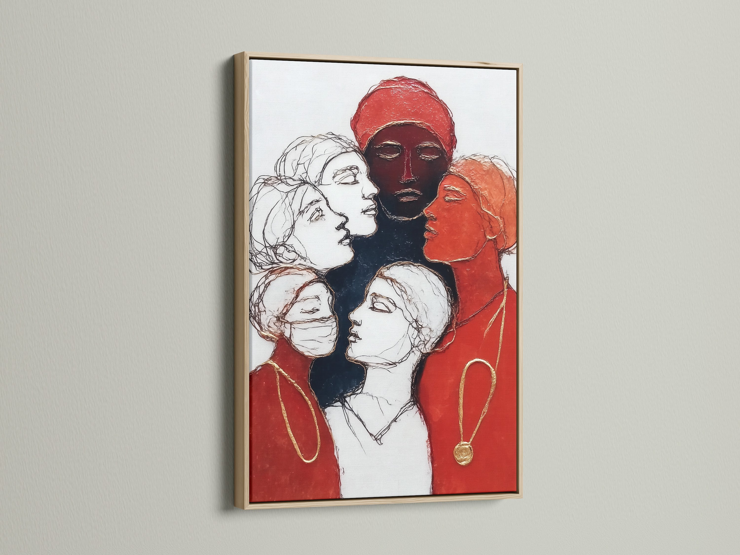 This is an oak frame displaying women empowerment art. The artwork features diverse female portraits in red and black contemporary colors. This canvas print is ideal for minimalist decor. Perfect for living rooms entryways and offices.