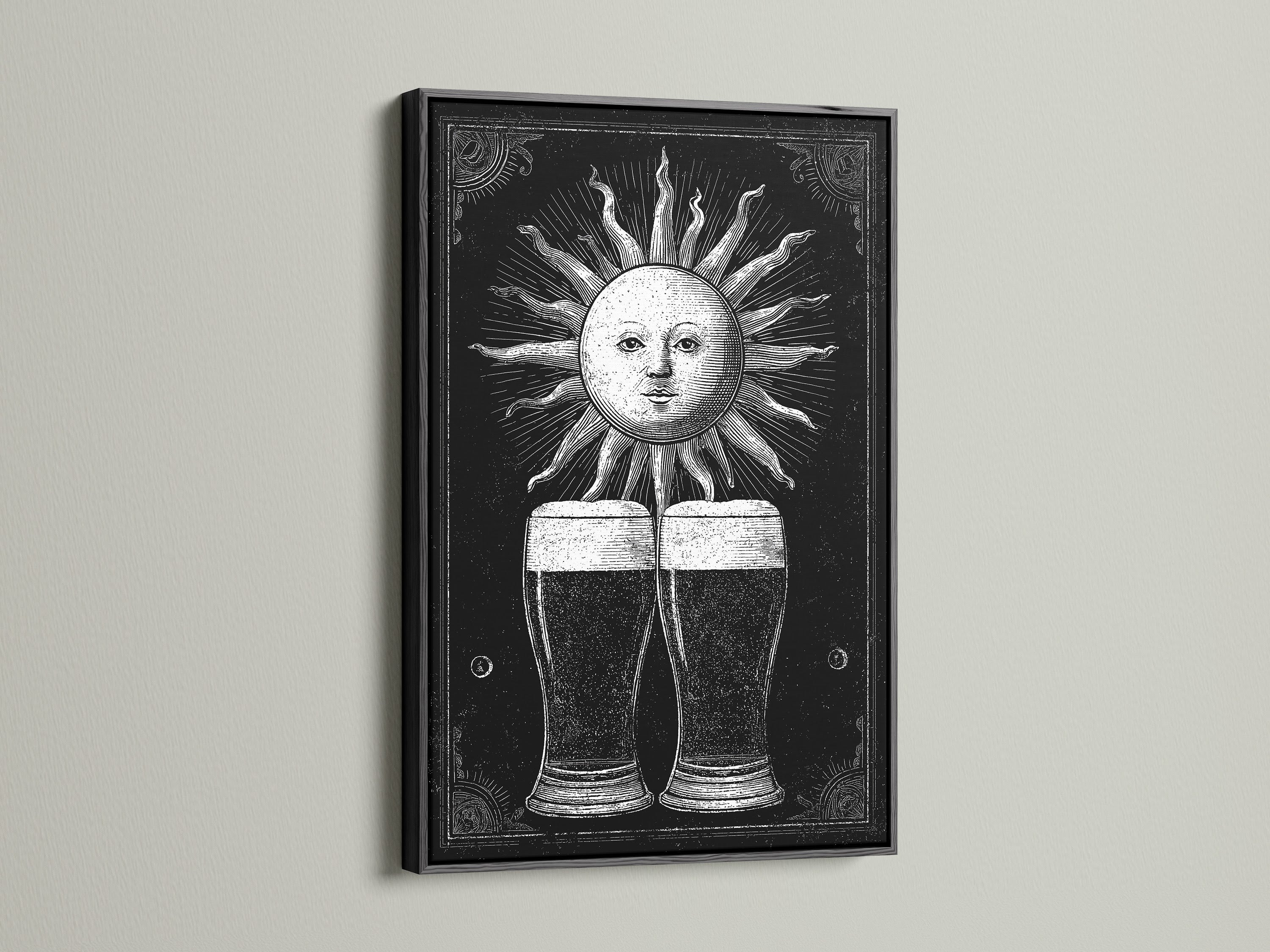Artwork framed in black. This piece features a vintage-style sun illustration. Two beer glasses are under the sun. Black frames offer a bold statement. This artwork is a unique addition to your decor.