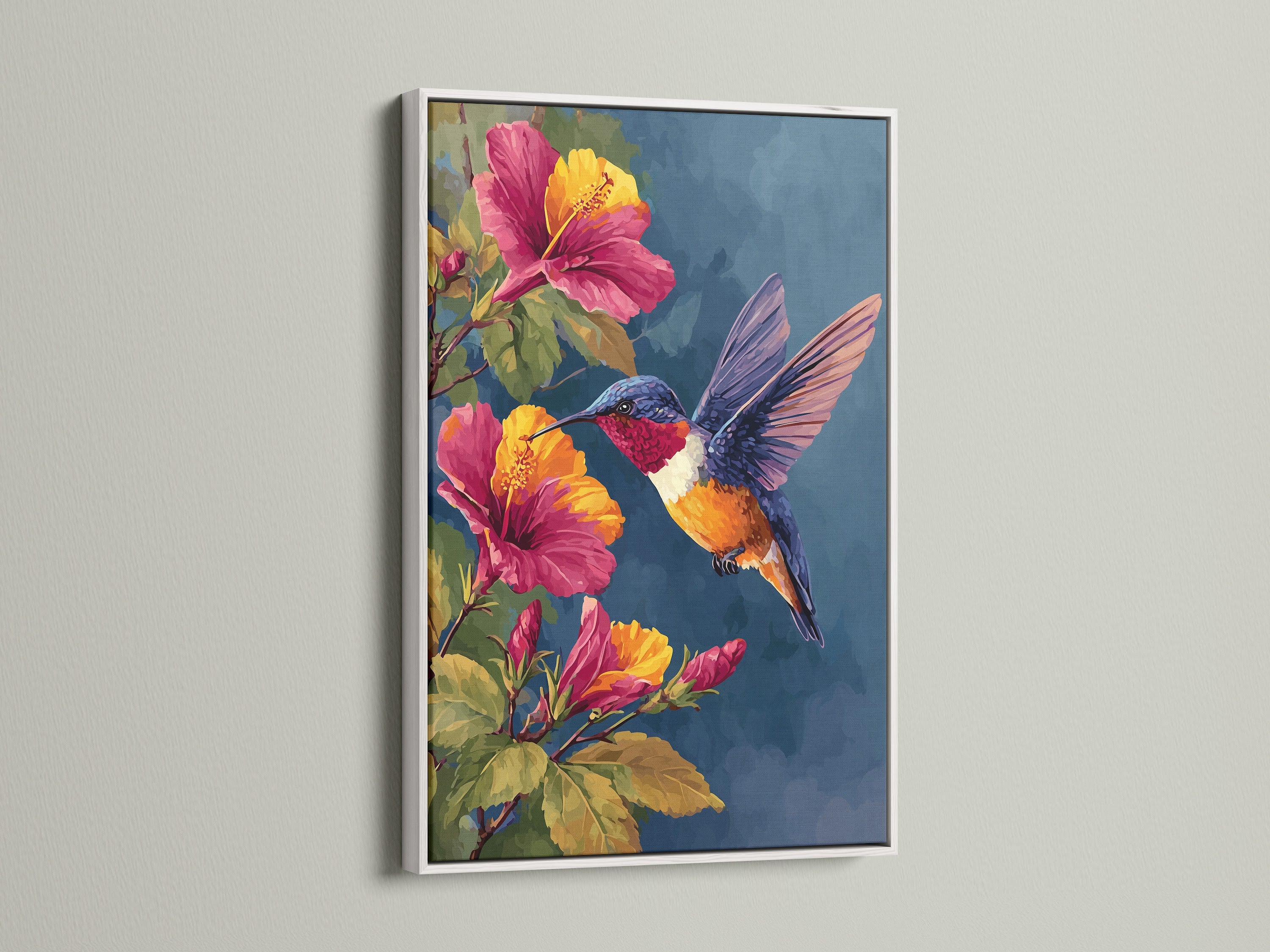 A white frame surrounds a colorful artwork of a hummingbird and hibiscus flowers. The white frame offers a clean modern look. This artwork brings a fresh and airy feel to your home decor. See available options.