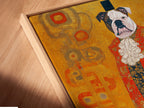 A close-up angled view shows the canvas print in a floating frame. The Gustav Klimt style dog portrait stands out. It is ready to hang in your study room. This ornate animal wall art adds sophistication. Notice the detail of this aristocratic art piece.
