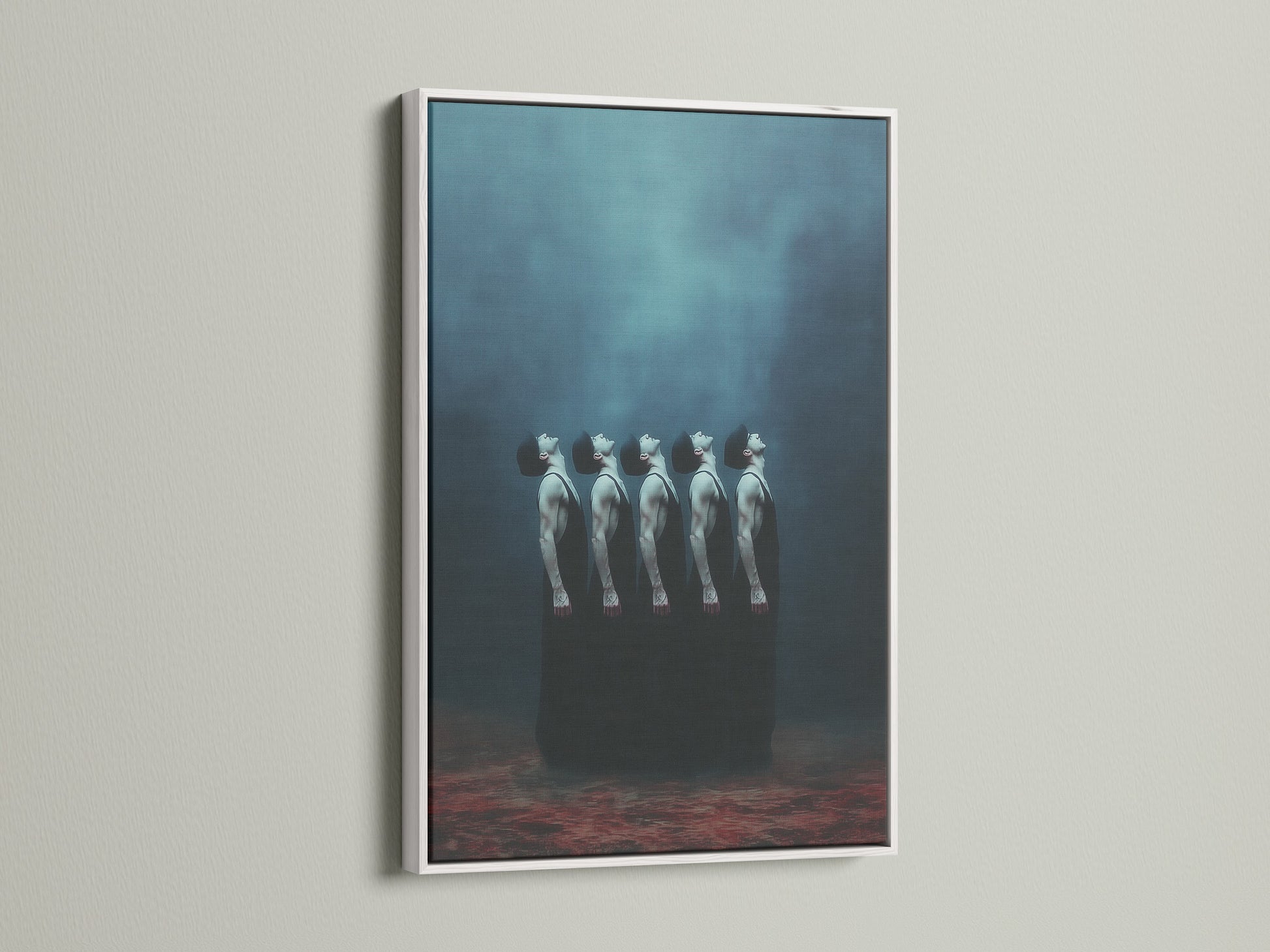 This image displays the surreal figures canvas print in a white frame. The teal wall art brings a moody ambiance to home decor. This ethereal print is perfect for meditation room art. It is a unique piece for modern homeowners.