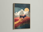 The buffalo artwork is displayed in an oak frame. The oak frame enhances the artwork's rustic charm. Its natural wood grain complements the buffalo and mountain art. Find the perfect oak-framed artwork for your space. Its warm tones bring nature indoors.