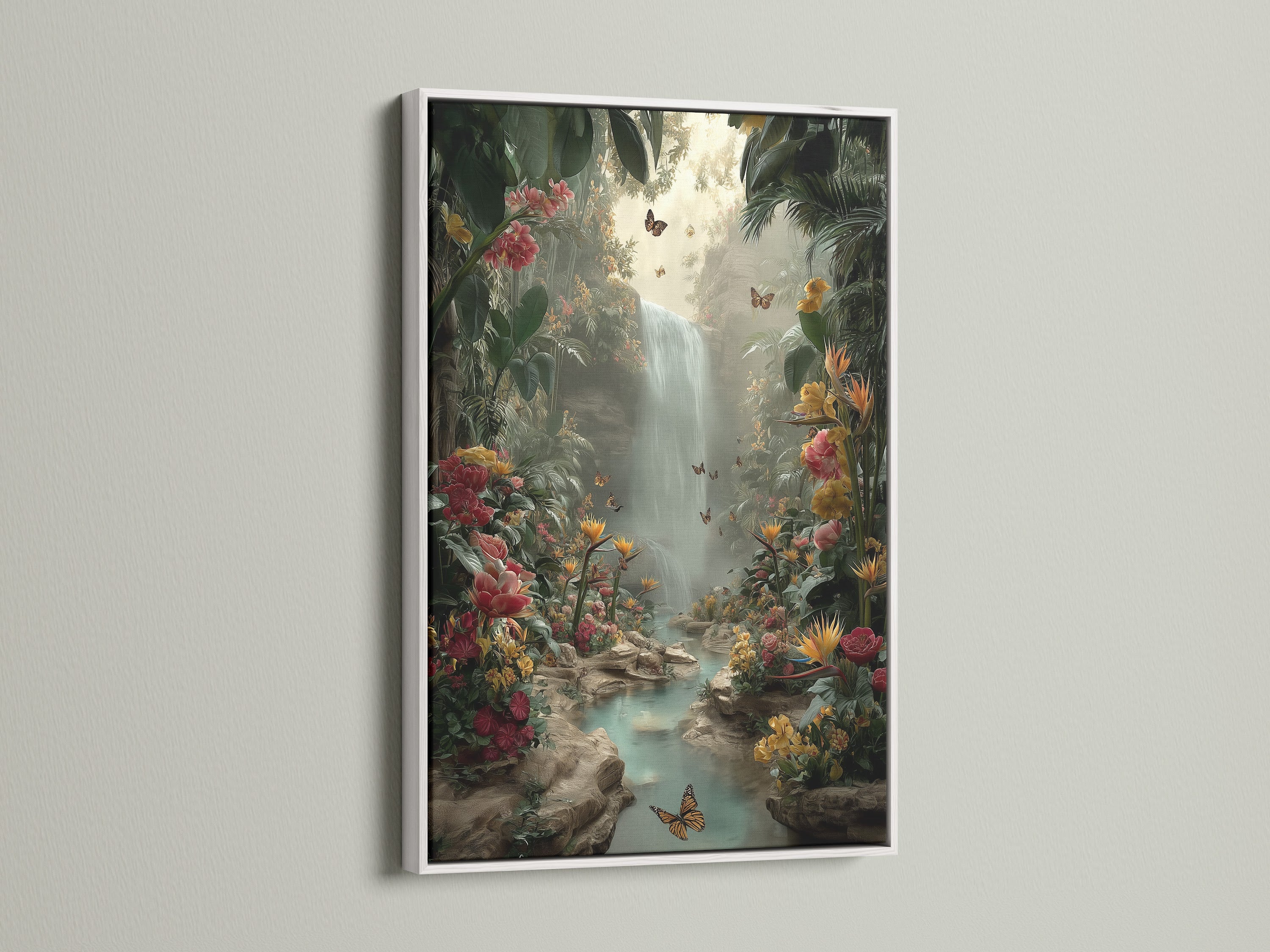 Tropical Waterfall canvas print displayed in a white frame. The artwork captures a lush jungle paradise with butterflies and a waterfall. The light frame enhances the vibrant colors of the scene.  Ideal for adding a fresh botanical touch to your living space. A calming nature scene.