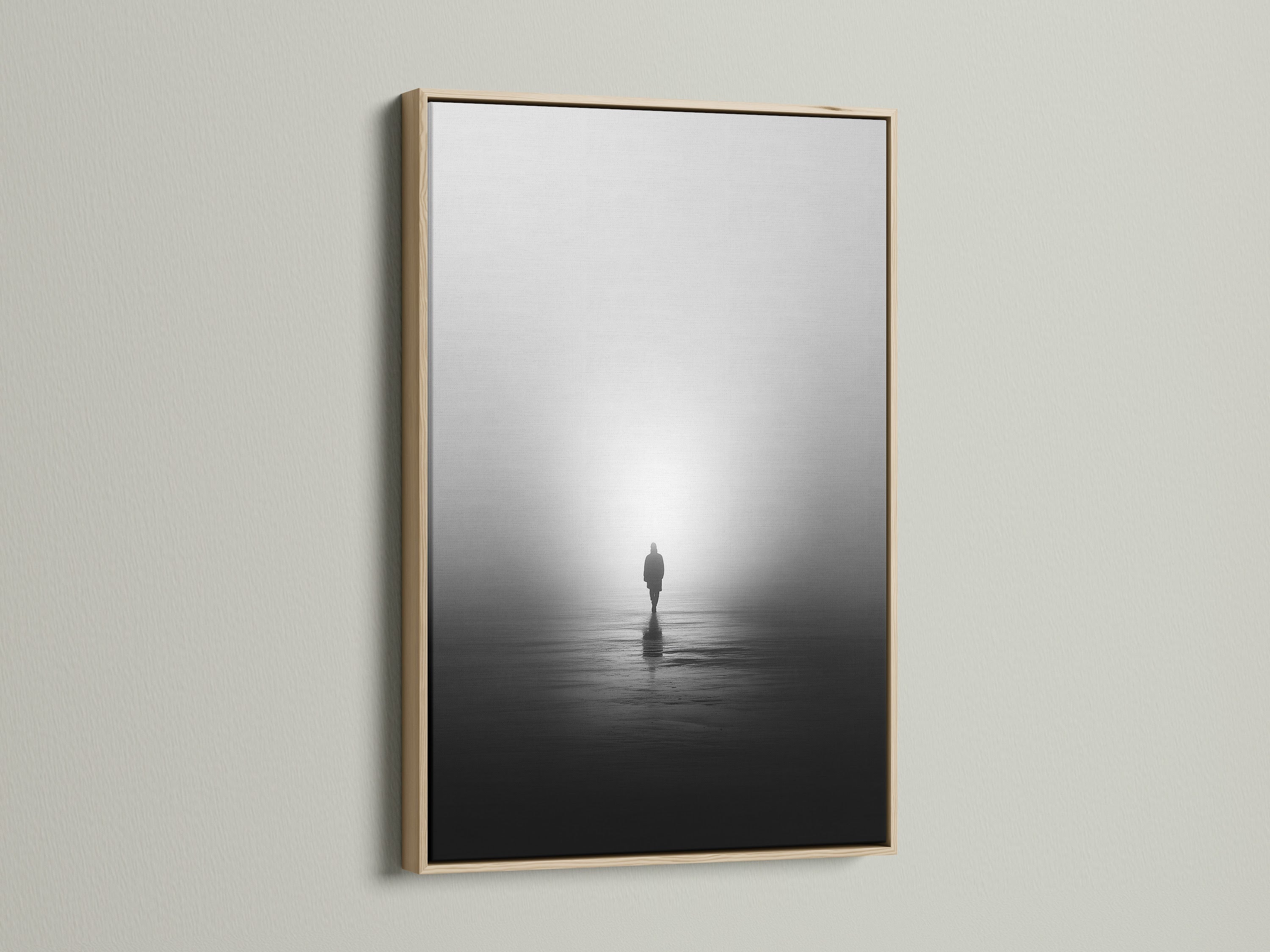 This is a serene minimalist solitude canvas print. The artwork features a foggy water reflection wall art. It is framed in a light oak. It enhances modern photography in any space.