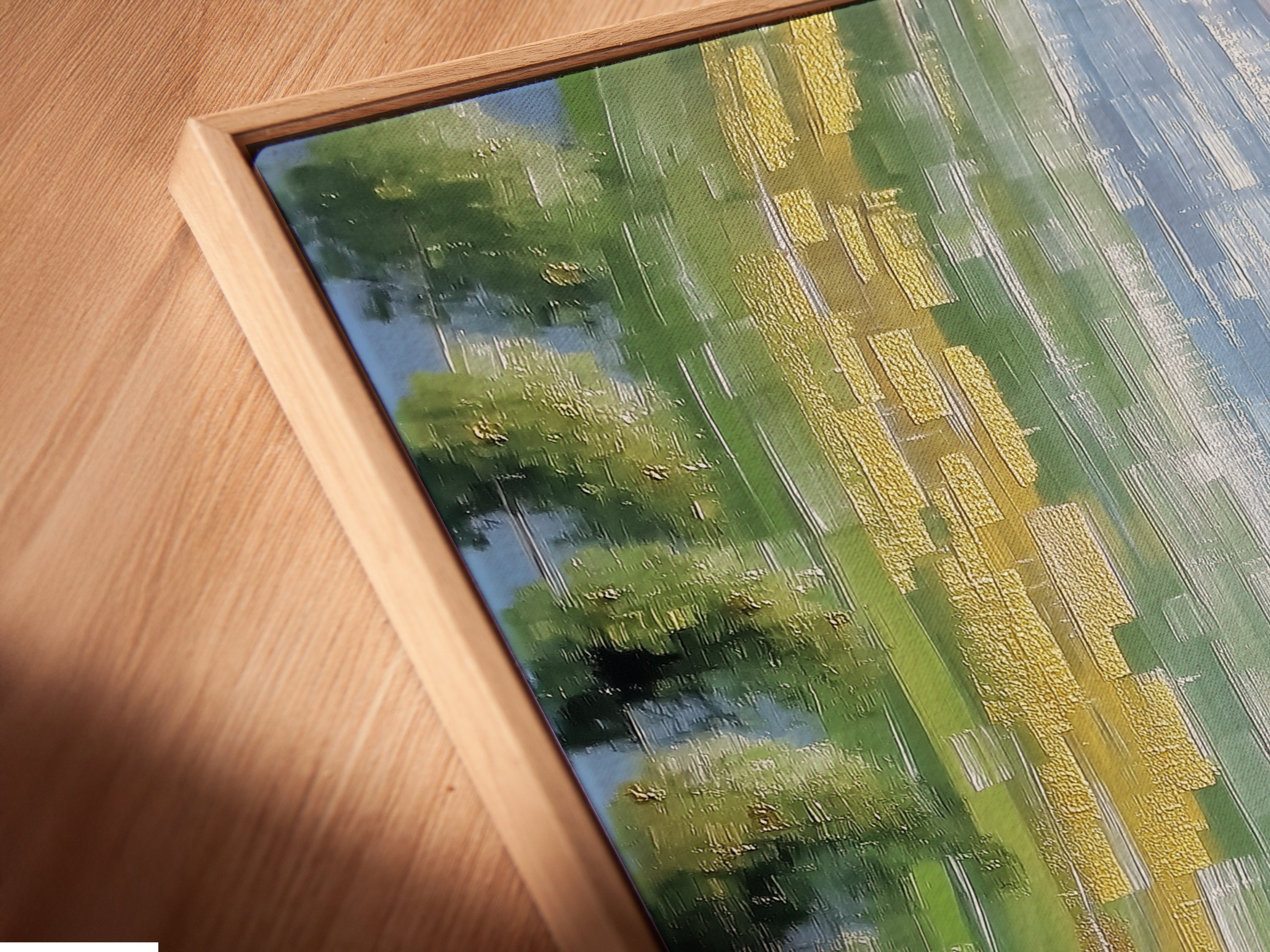 Angled close up of a canvas print in a floating frame. This abstract canvas art adds depth to the artwork. The floating frame enhances the river print. It's a modern art print perfect for any room. Nature wall decor at its finest.