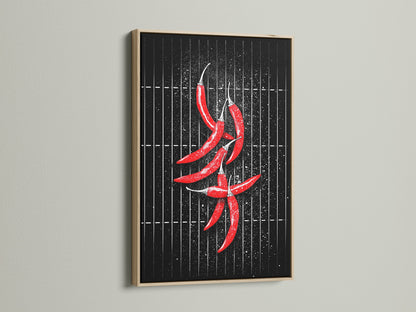 Elevate your dining room art with a red chili print in an oak frame. This modern kitchen wall art is a great foodie gift. The spicy food art adds a contemporary touch.