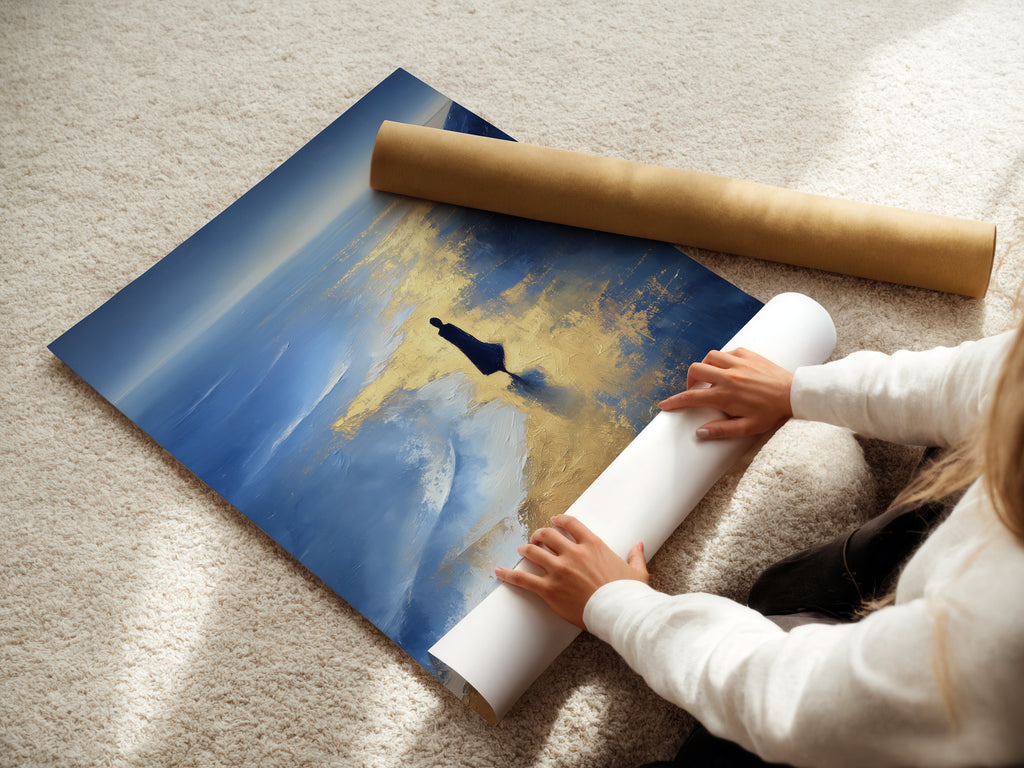A woman carefully rolls a fine art poster paper of the Ocean Reflection artwork. This shows the care in preparing your coastal wall art. The blue and gold abstract beach scene is ready to be displayed. Choose this option for a lightweight and versatile ocean canvas print.