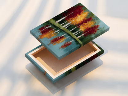 A stretched canvas print of autumn trees artwork. The reflected landscape wall art showcases a teal blue lake painting. This canvas print is ready to hang. Perfect for adding color and style to your living room or office.