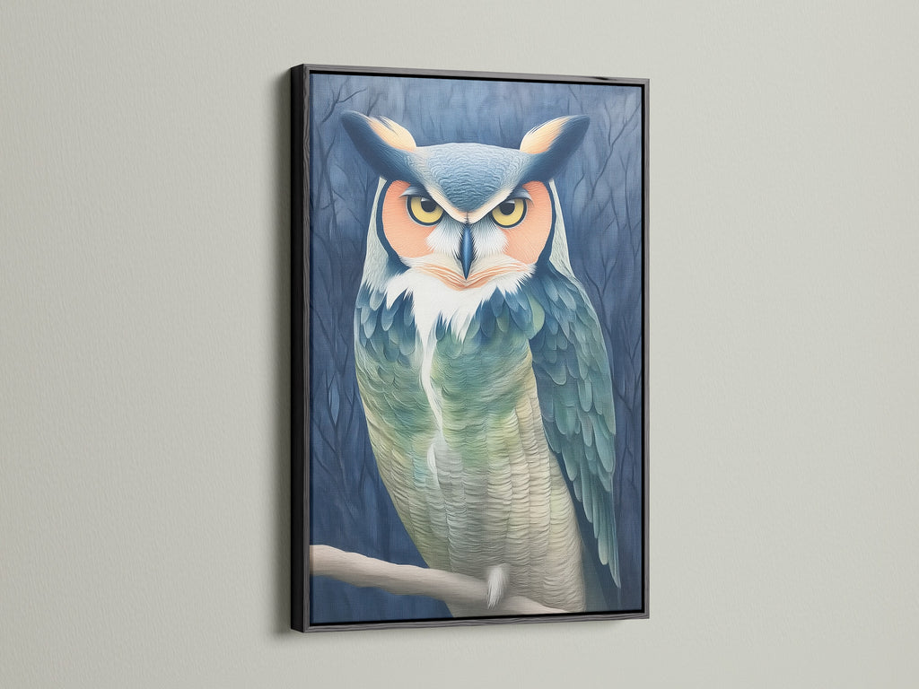 This striking owl portrait canvas print is set in a black frame. The moody bird wall art creates a focal point in any room. Teal and beige tones enhance the animal artwork. Great addition to a study room or library wall decor.