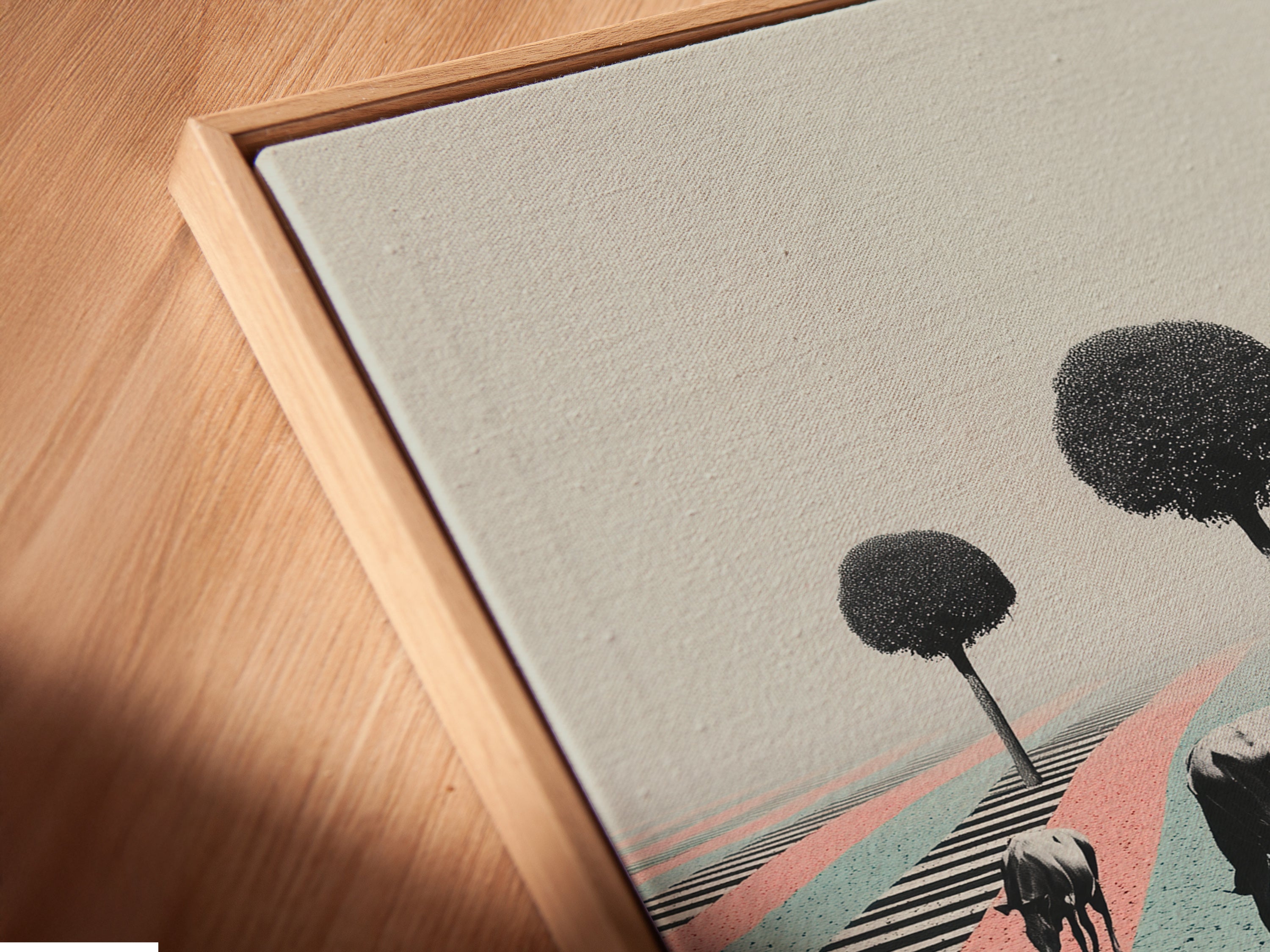 A close-up of a canvas print in a floating frame. The art features cows on a cracked zebra crossing. Pastel colors create a surreal modern look. Discover the unique floating frame option for your wall art.