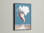 Surreal Coffee Cup Artwork in a Black Frame. It features a desert landscape and dreamy cloudscape. This modern art print is ideal for office wall art. The black frame makes it a unique wall decor piece. Great for modern and eclectic styles.