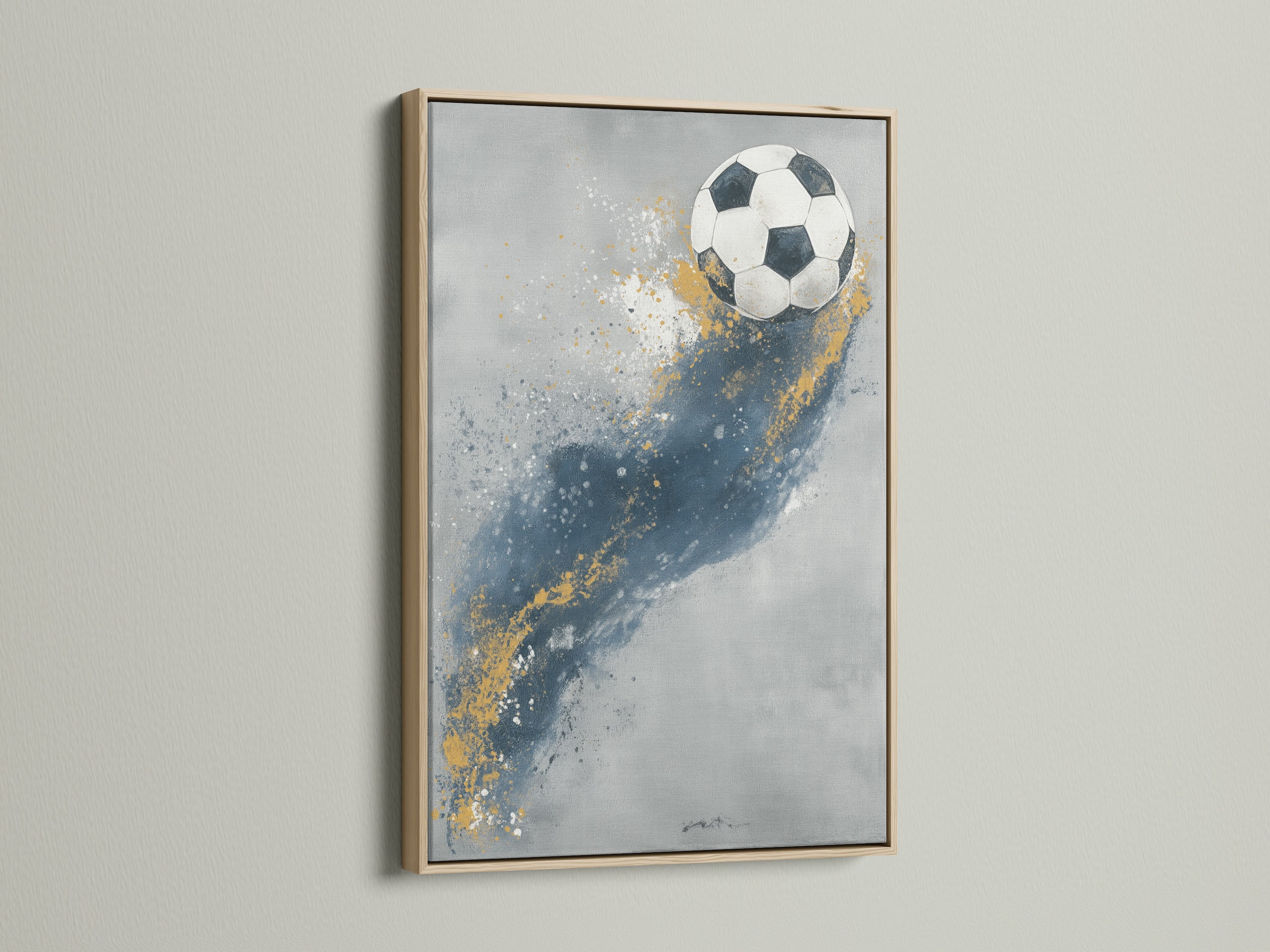 This sports canvas print features a blue and gold soccer ball design. It is showcased in an oak frame. The artwork adds a touch of athletic decor to any space. Perfect for boys rooms and game rooms. Elevate your sports themed decor with this print.