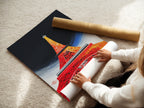 A woman is carefully rolling a fine art poster paper featuring the Eiffel Tower. Our fine art poster paper ensures vibrant colors and sharp details. Get ready to display your France poster with a professional touch. Perfect for framing or displaying as is.