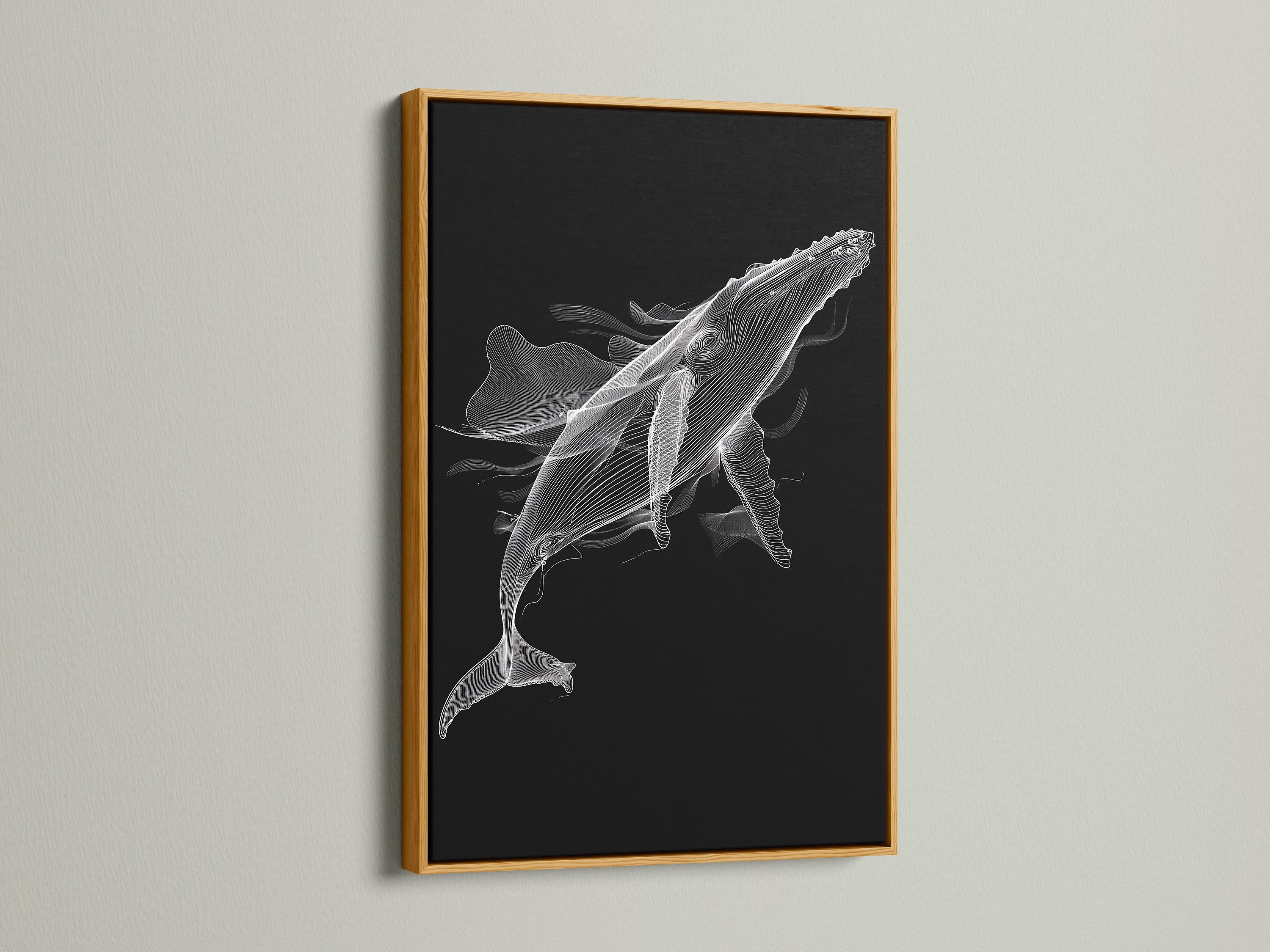 A black and white whale artwork is presented in a luxurious gold frame. This minimalist ocean canvas print adds a touch of elegance. Perfect for enhancing your home office or study. The gold frame highlights the whale artwork. This marine animal art is sure to impress.