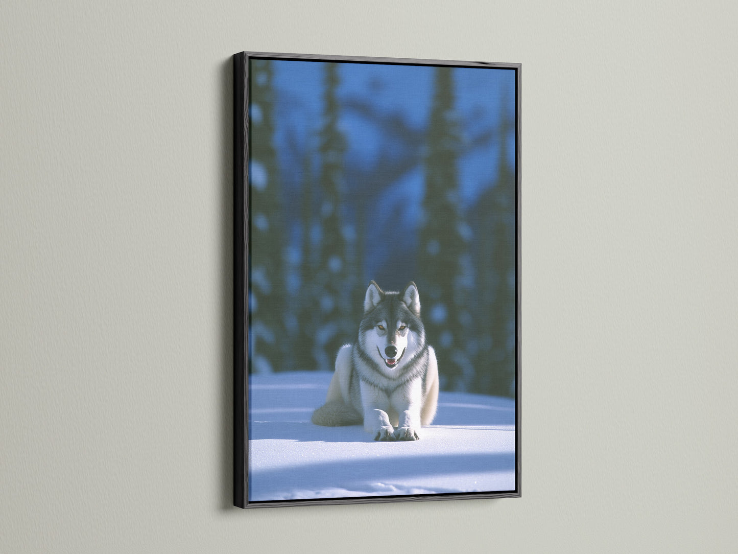 Wolf in Snow canvas print in a black frame. This canine artwork looks striking against a light wall. Black frame adds a touch of elegance to this winter landscape artwork. The black frame makes the colors in the nature print pop.