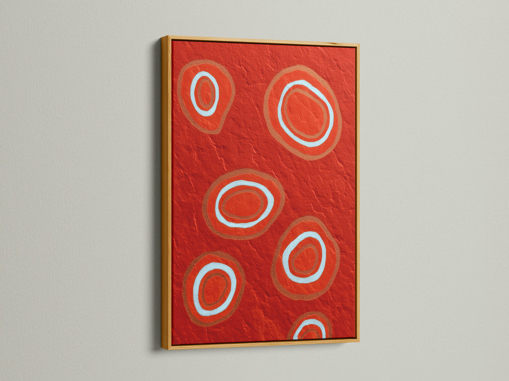 This gold frame enhances the vibrant abstract red artwork. The geometric canvas print offers a modern wall decor solution. Its bold circles gleam within the luxurious gold frame. A perfect addition to any contemporary space. Discover the elegance of this modern art piece. The gold frame adds a touch of glamour.