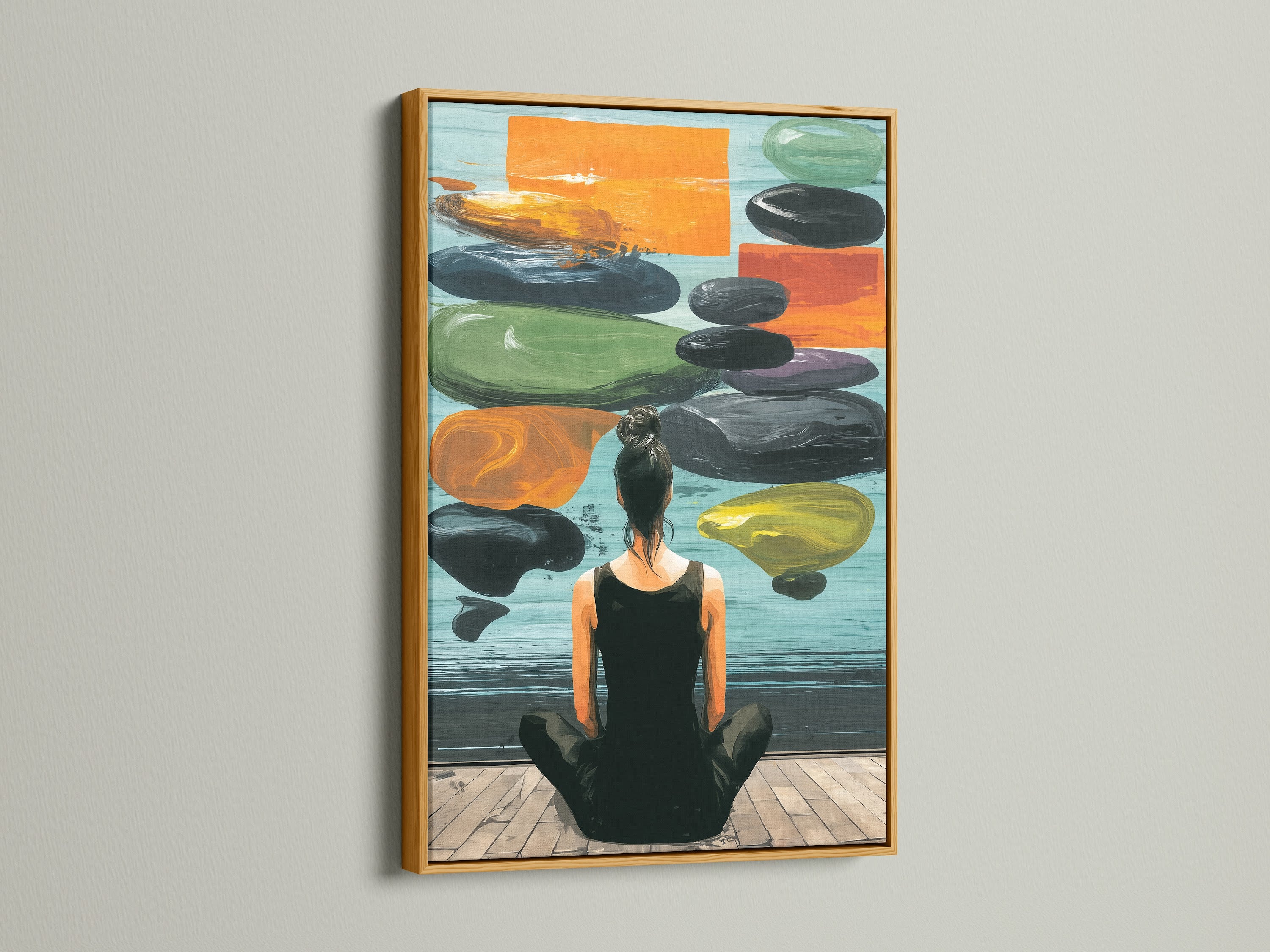 Zen Wall Art in a gold frame is displayed on a white wall. This artwork features a woman meditating. The artwork creates a peaceful atmosphere. Enhance your home with this beautiful art.
