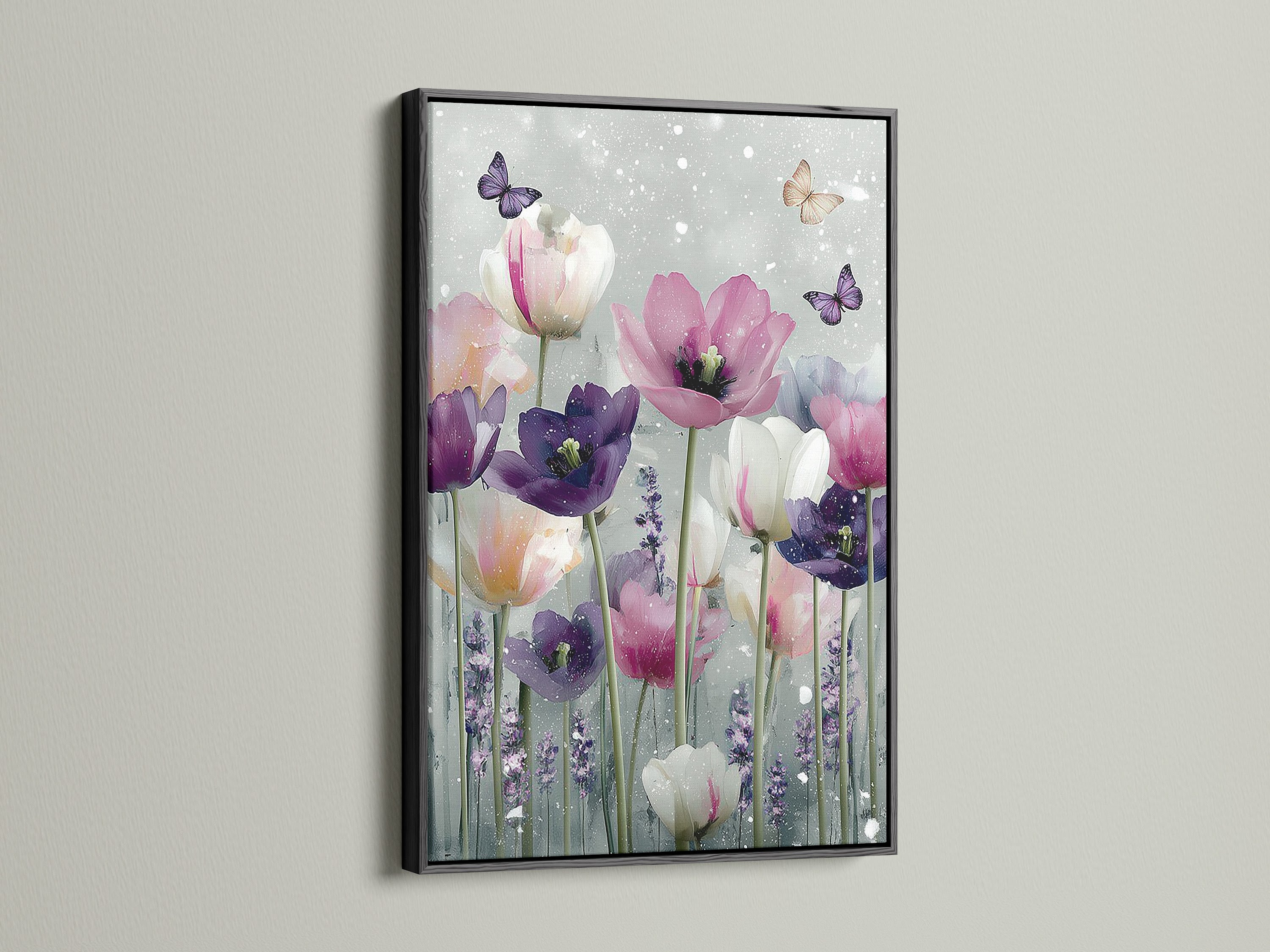 A striking black frame surrounds a captivating floral art print. The art features tulips and butterflies. The black frame adds a bold sophisticated touch. Make a statement with framed art. Explore our options today.