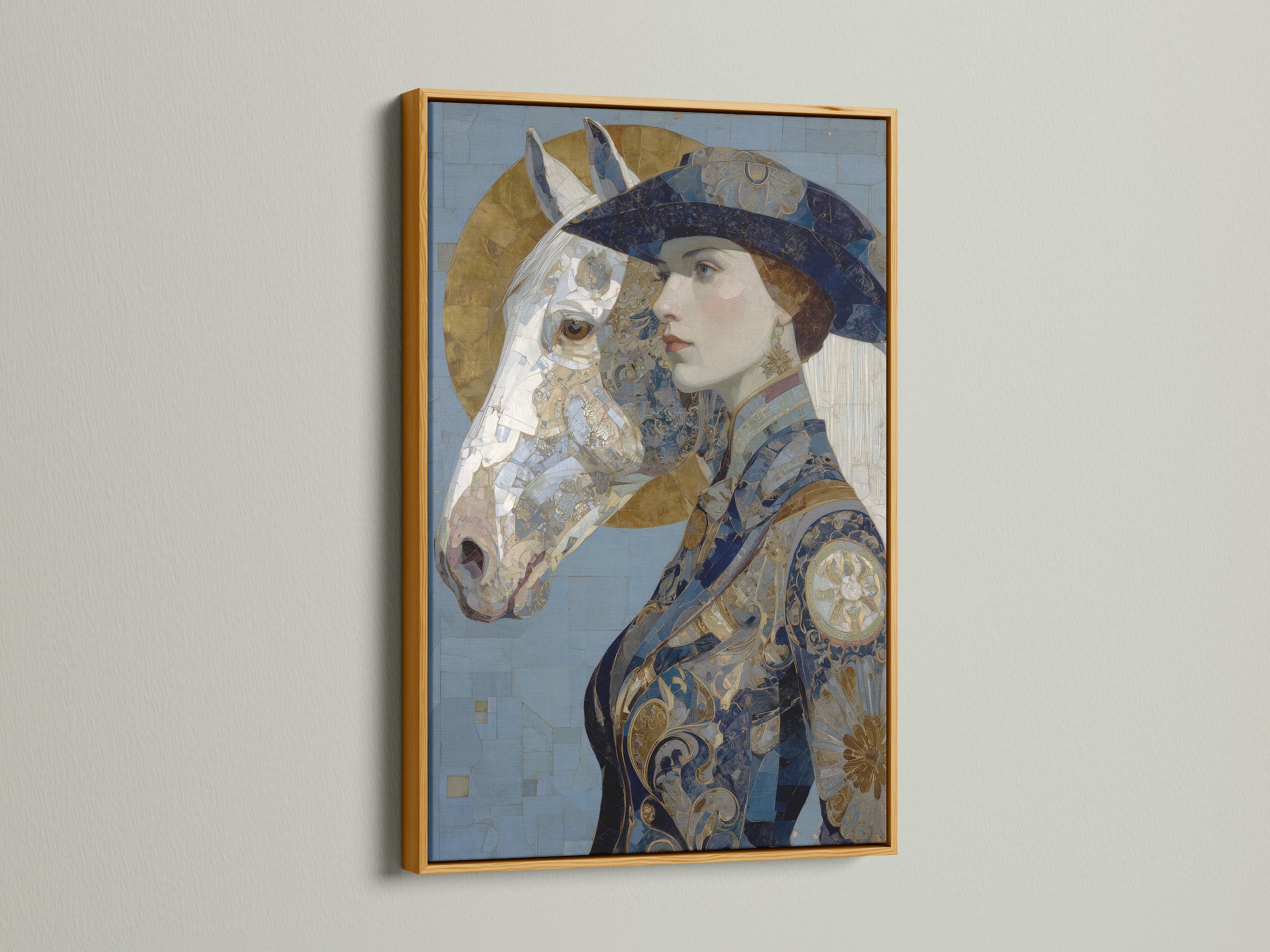 A luxurious Art Nouveau Woman Canvas Artwork is framed in gold. The artwork presents a vintage portrait of a woman and horse in blue and gold tones. Create a focal point with this ornate wall decor. Ideal for adding a touch of art deco style to your living room or bedroom. Buy now and enrich your home decor.
