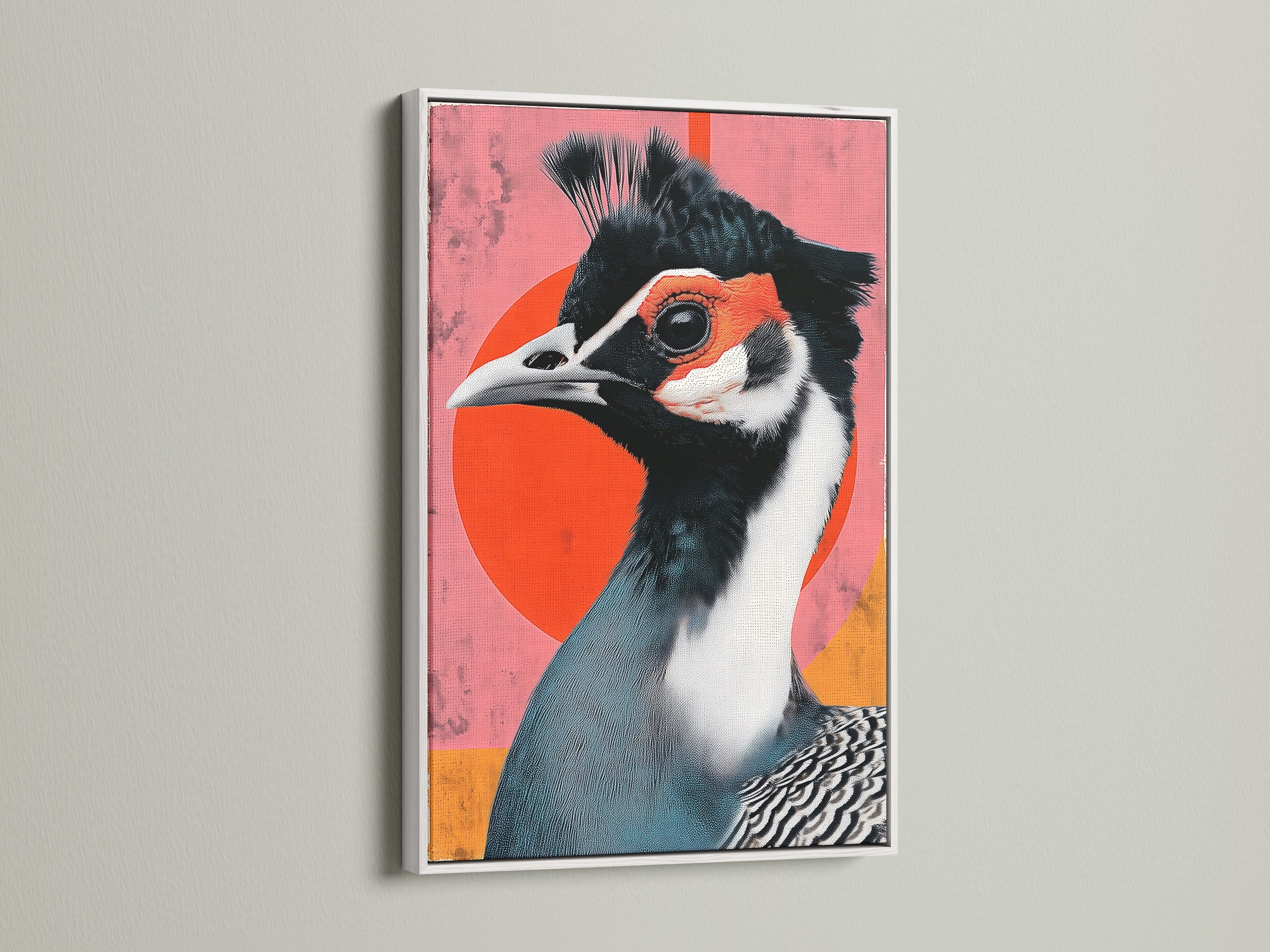 Exotic Bird art print in a white frame. This contemporary artwork features a bird with teal and white feathers. A red circle accents the background. This bird canvas print is perfect for adding color to your home or office. It is a great gift for bird lovers.