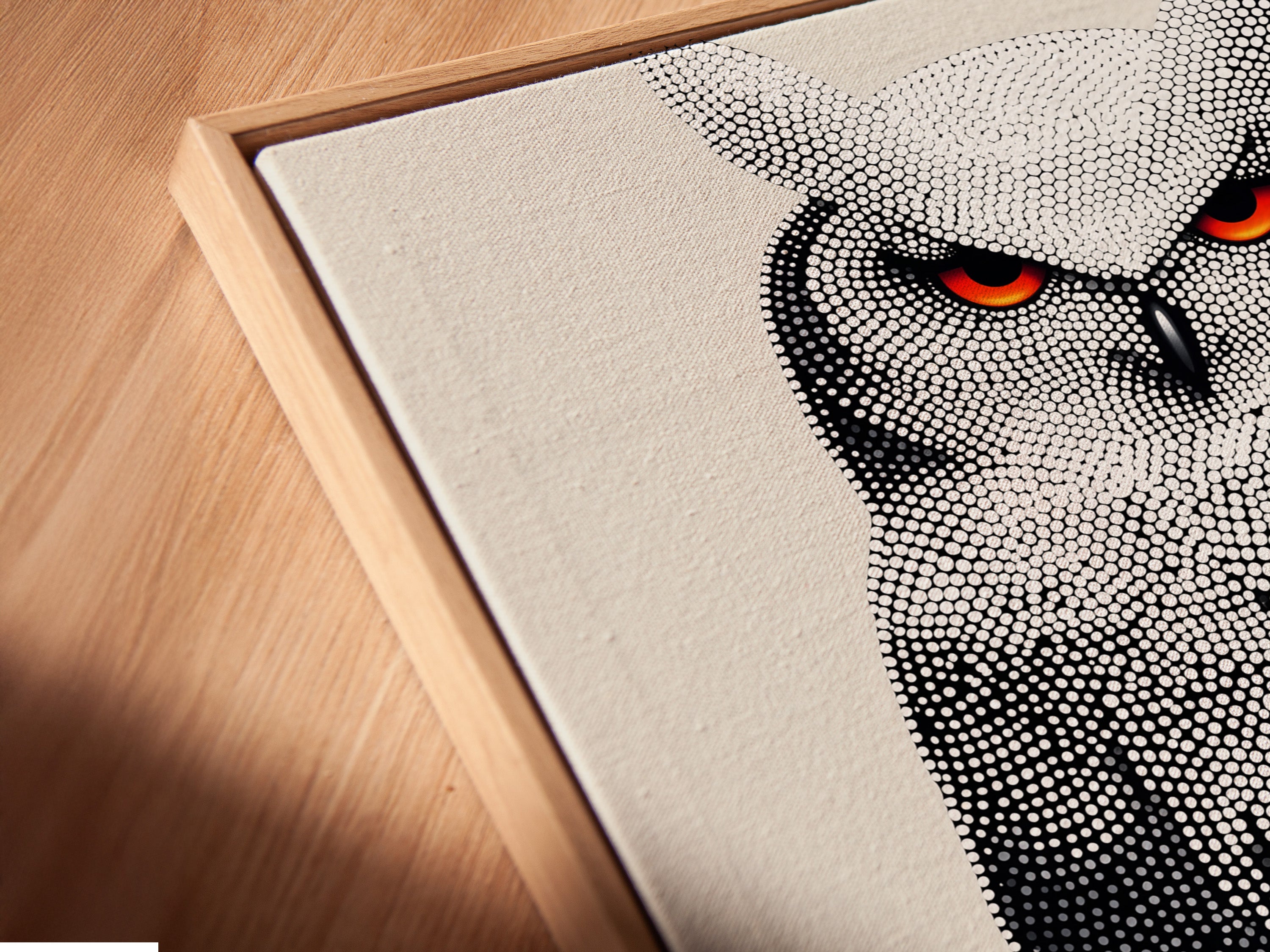 A close-up of a canvas print in a floating frame. The owl artwork features dotted wildlife art. This modern animal wall decor enhances any space. Perfect for contemporary homes and offices. A stylish choice.