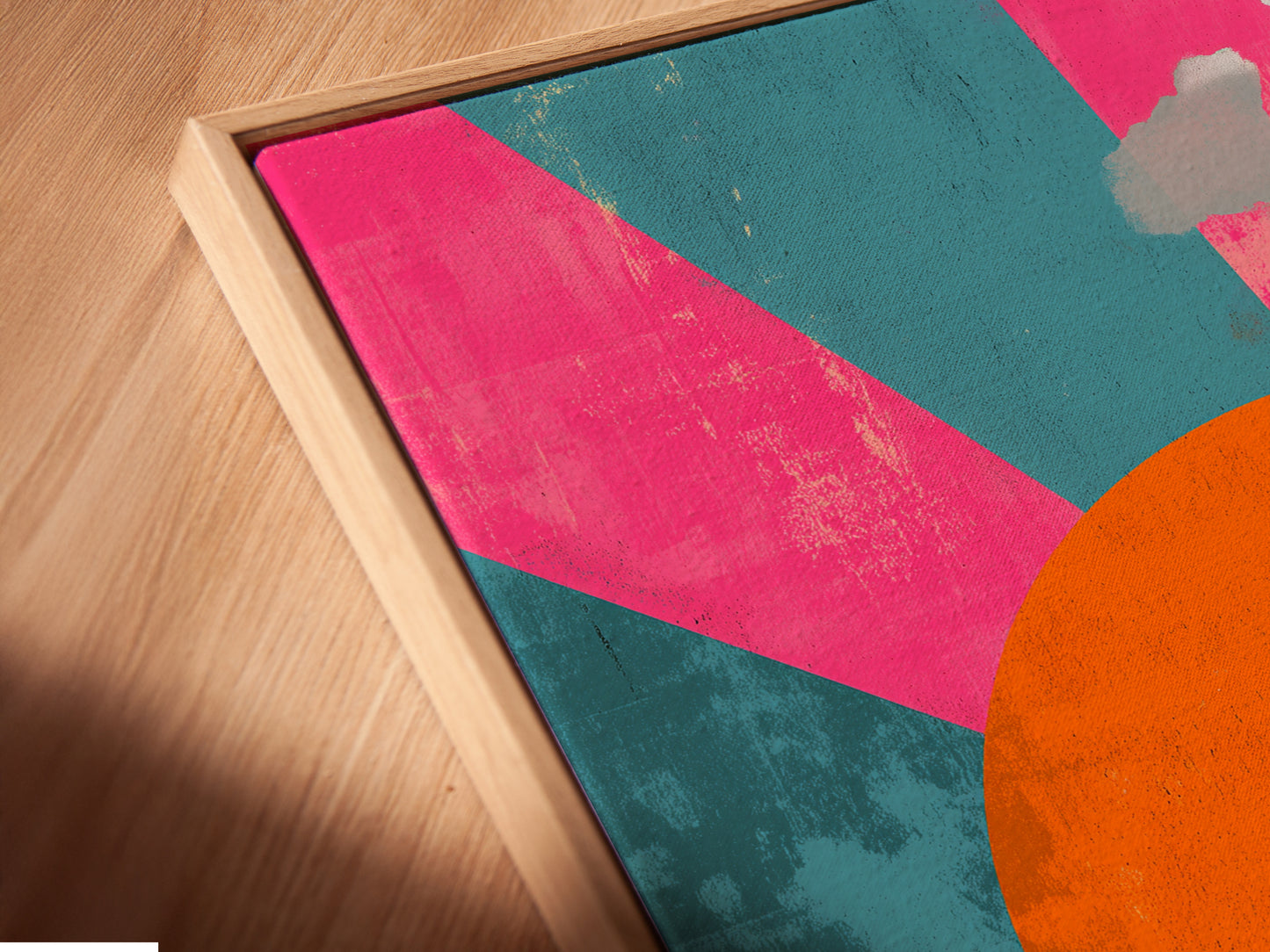 This is a close-up angled view of a canvas print in a floating frame. The surreal landscape features a retro sun a cow and a man. The floating frame enhances the artwork's contemporary appeal. It is perfect for modern interiors.