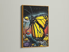 Elegant Monarch Butterfly art print in a gold frame. The floral insect canvas brings a touch of nature to your decor. Perfect for adding a modern and whimsical touch to any room. Yellow accents brighten up your walls.