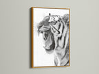 A gold frame surrounds a stunning tiger artwork. The metallic sheen of the gold adds a touch of luxury. It enhances the overall richness of the piece. Perfect for adding a touch of glamour to your home decor. Discover the allure of framed art.
