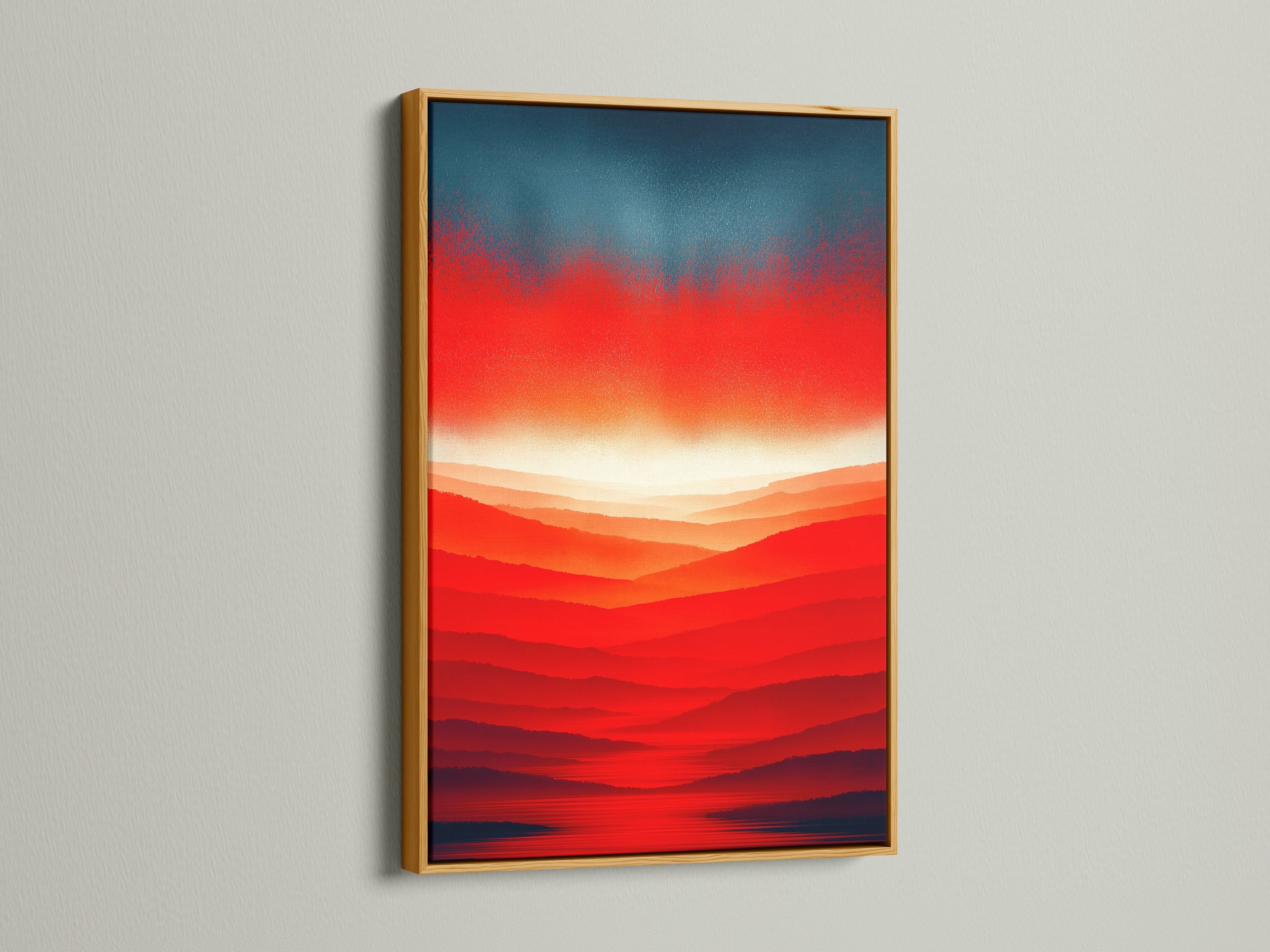 An eye-catching abstract sunset artwork with a red orange mountain landscape is displayed in a gold frame. This modern canvas print adds a touch of luxury. The contemporary print enhances your home decor.
