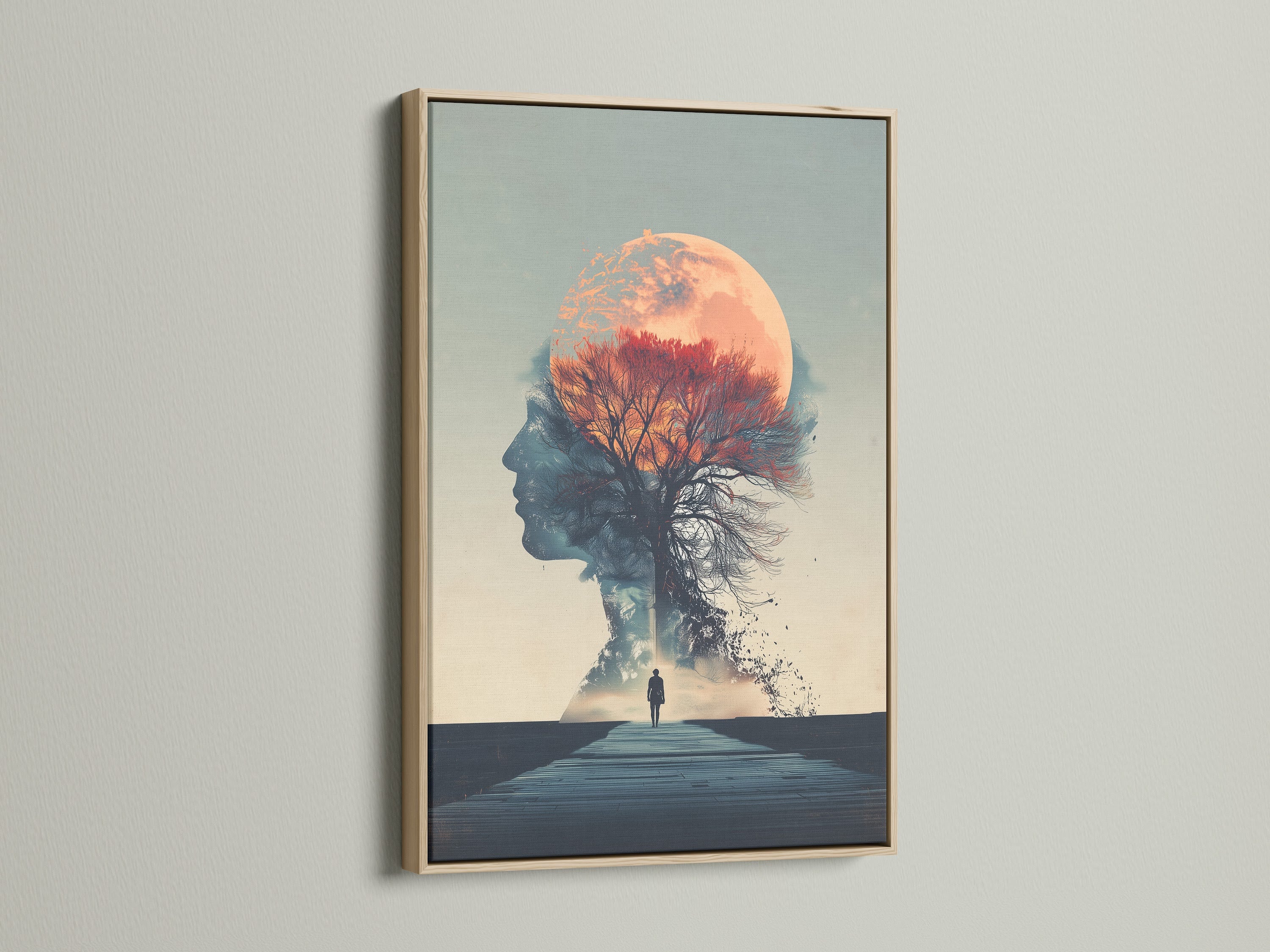 This is a surreal double exposure artwork in an oak frame. The artwork combines a woman silhouette with a moon and a tree. This mindful wall decor enhances bedroom aesthetics. Discover the beauty of nature portrait art with our canvas prints.