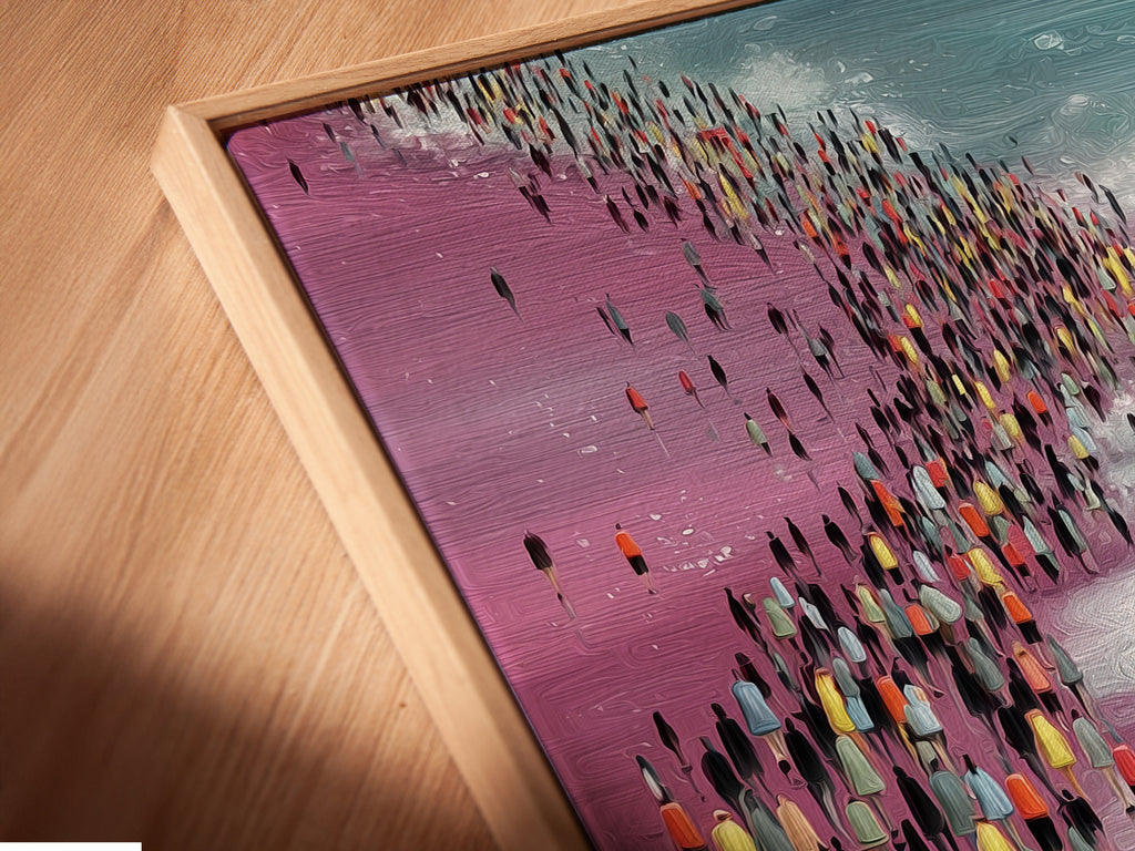 Angled close up of a canvas print in a floating frame. The artwork features an orange Volkswagen van on a beach with a crowd of people. The floating frame enhances the artwork's presentation. Perfect for adding a retro touch to your wall decor.