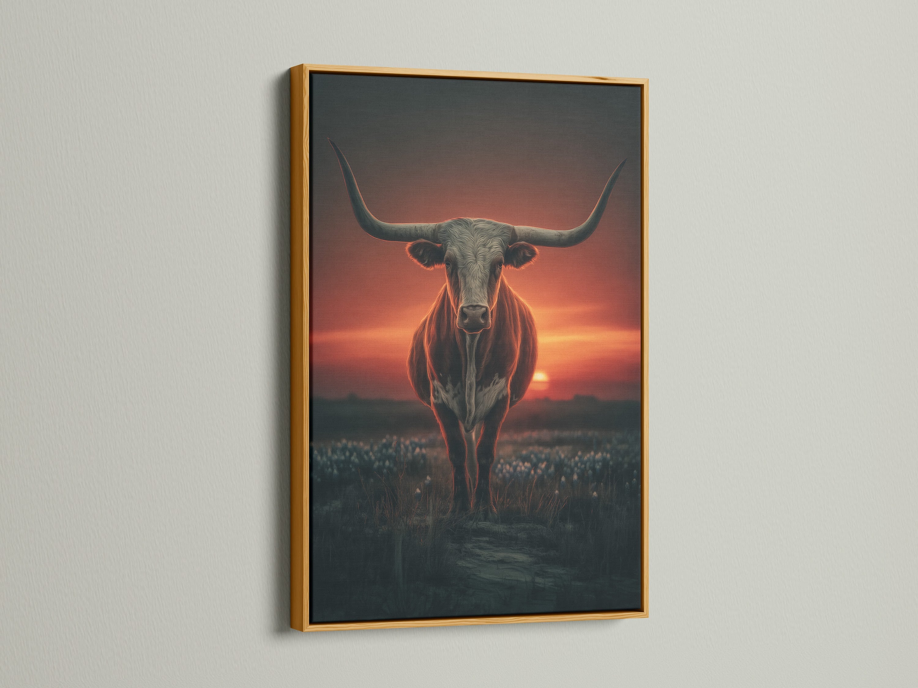Longhorn bull artwork in a gold frame. This western wall art features a sunset backdrop. The gold frame adds a touch of elegance to the rustic artwork. Ideal for enhancing your country wall art collection. This bull canvas print adds a luxurious feel.