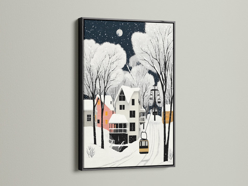 Winter Village art in a black frame hangs against a clean white wall. This winter landscape art complements bohemian and eclectic styles. The snow village print offers a sophisticated seasonal wall art solution.
